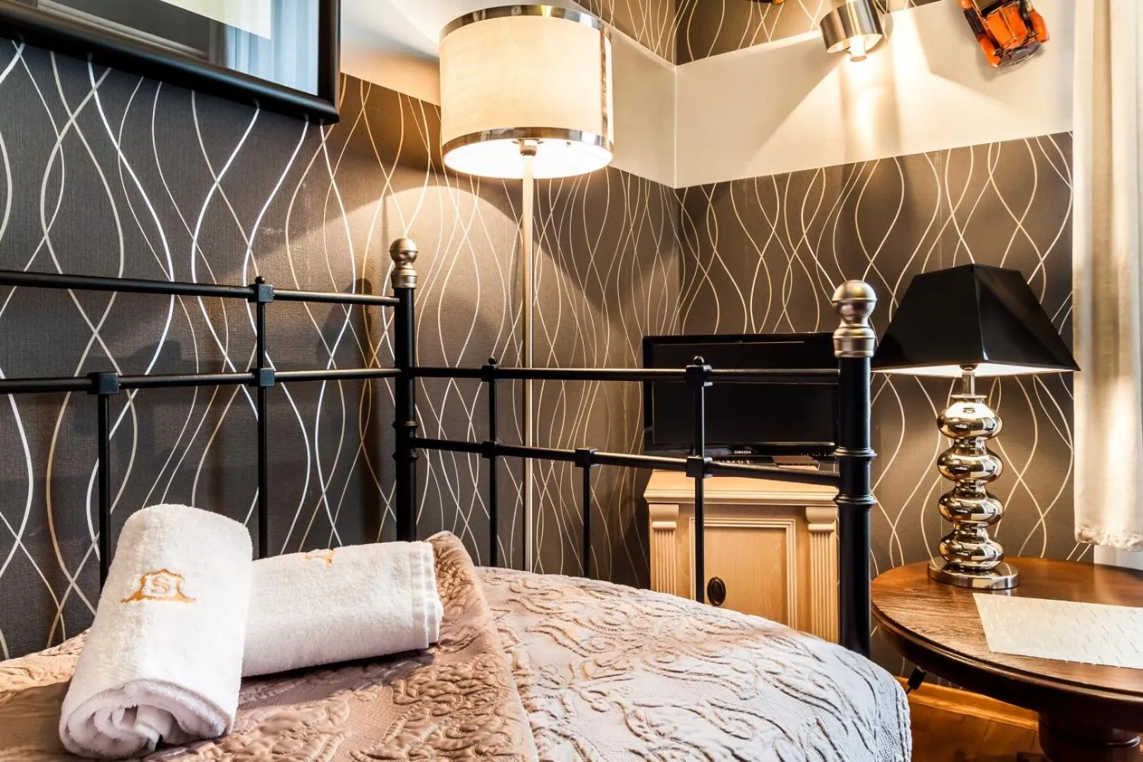 Bed in Aparthotel Oberża