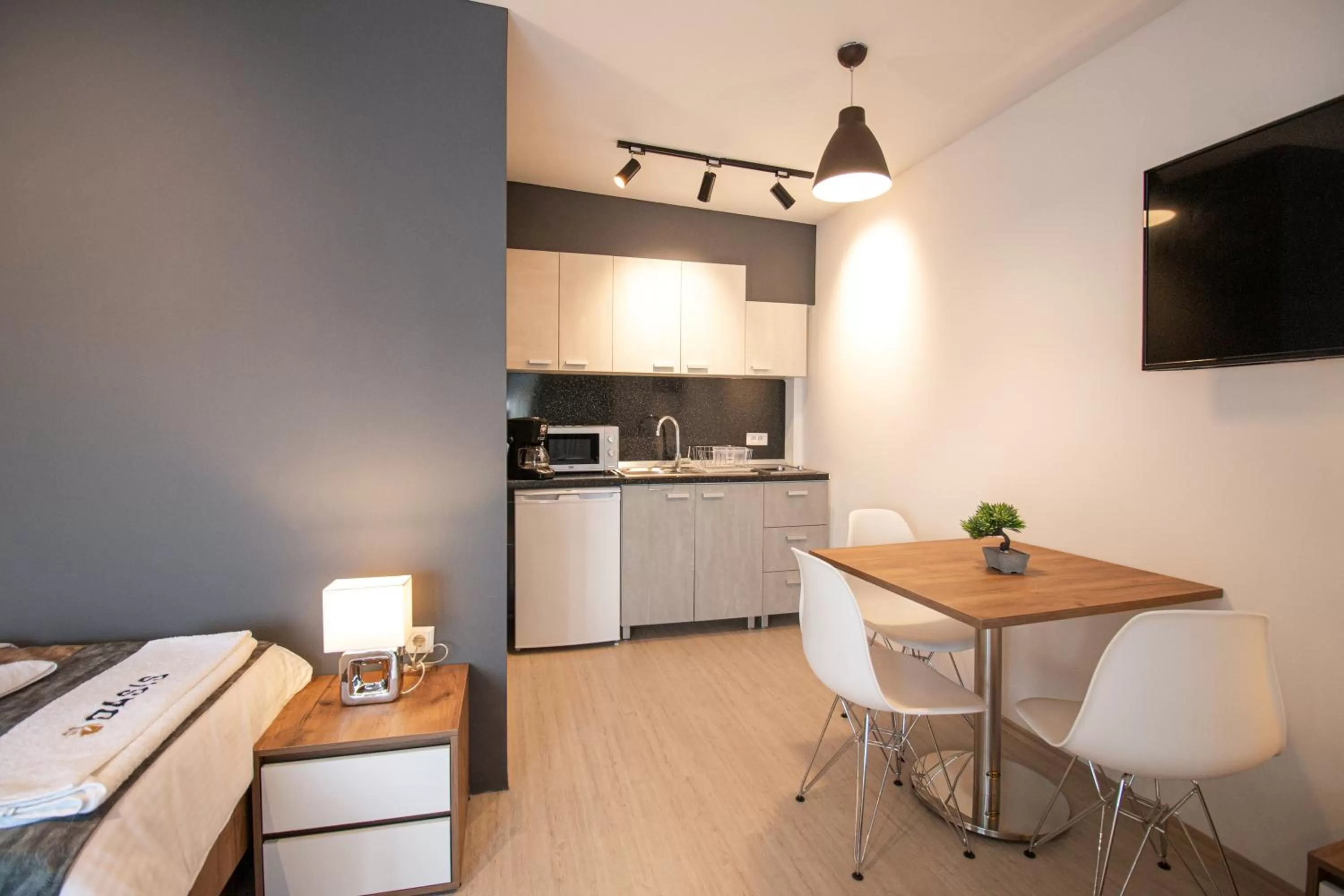 Kitchen or kitchenette in OASIS Apartments