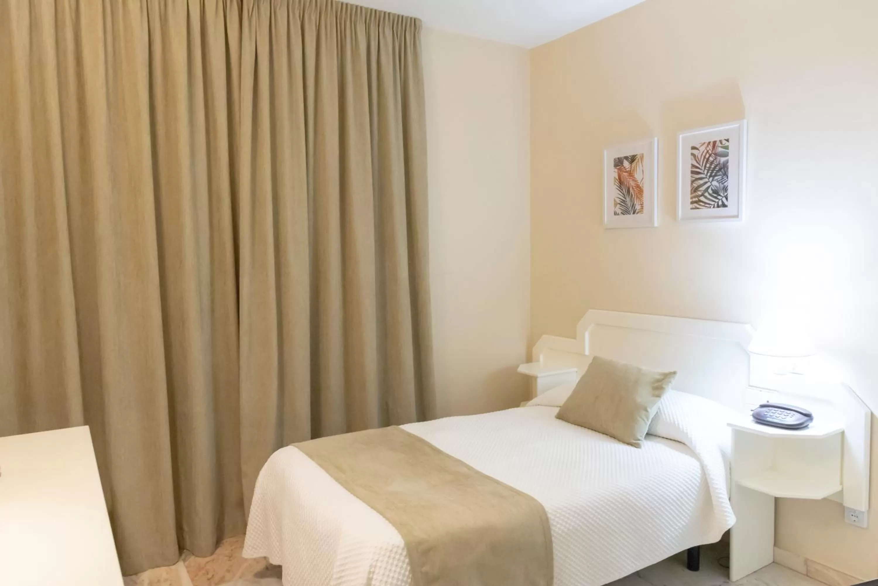 Bed in Hotel Ramomar