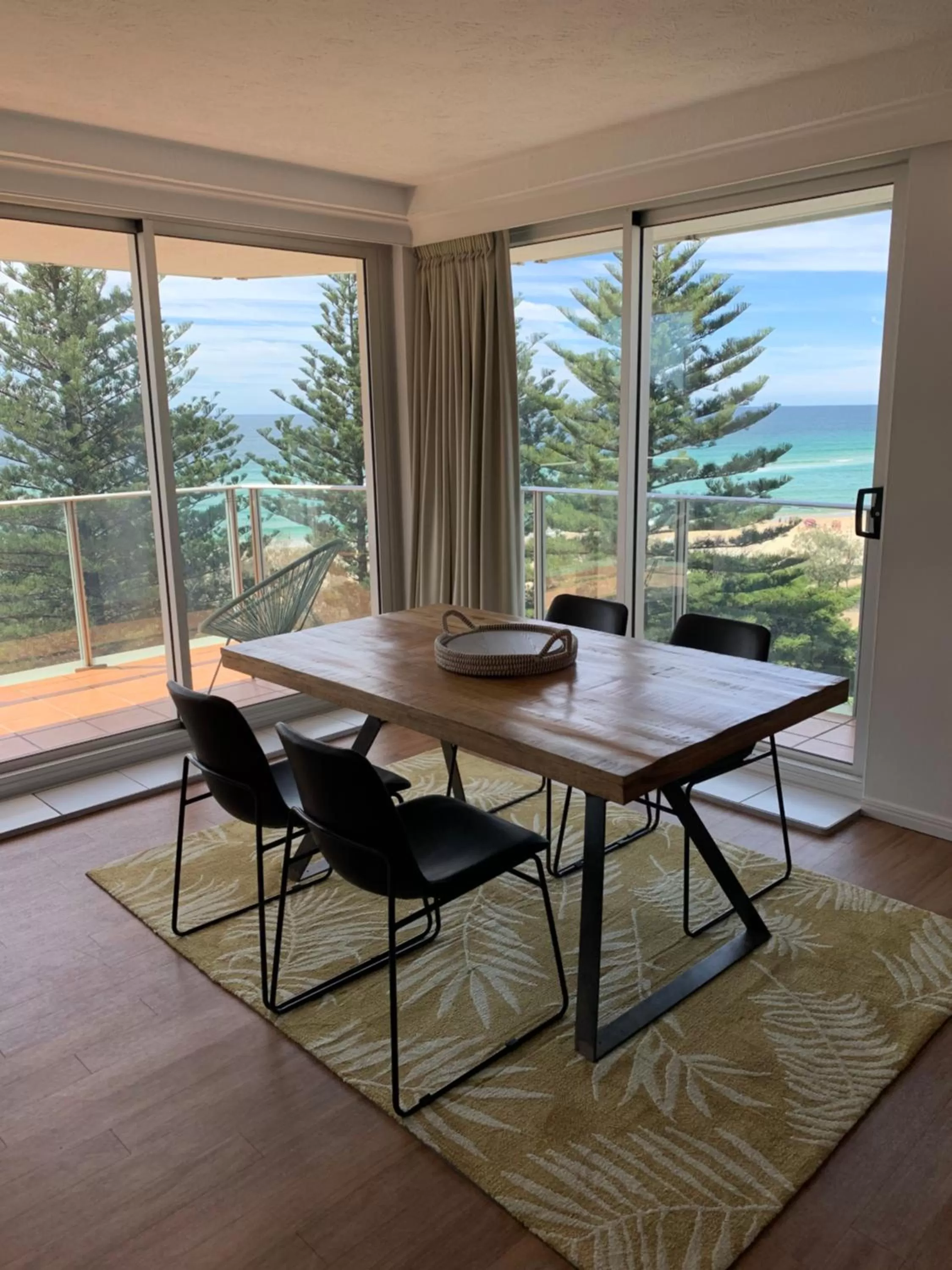 Dining area in Pacific Regis Beachfront Holiday Apartments