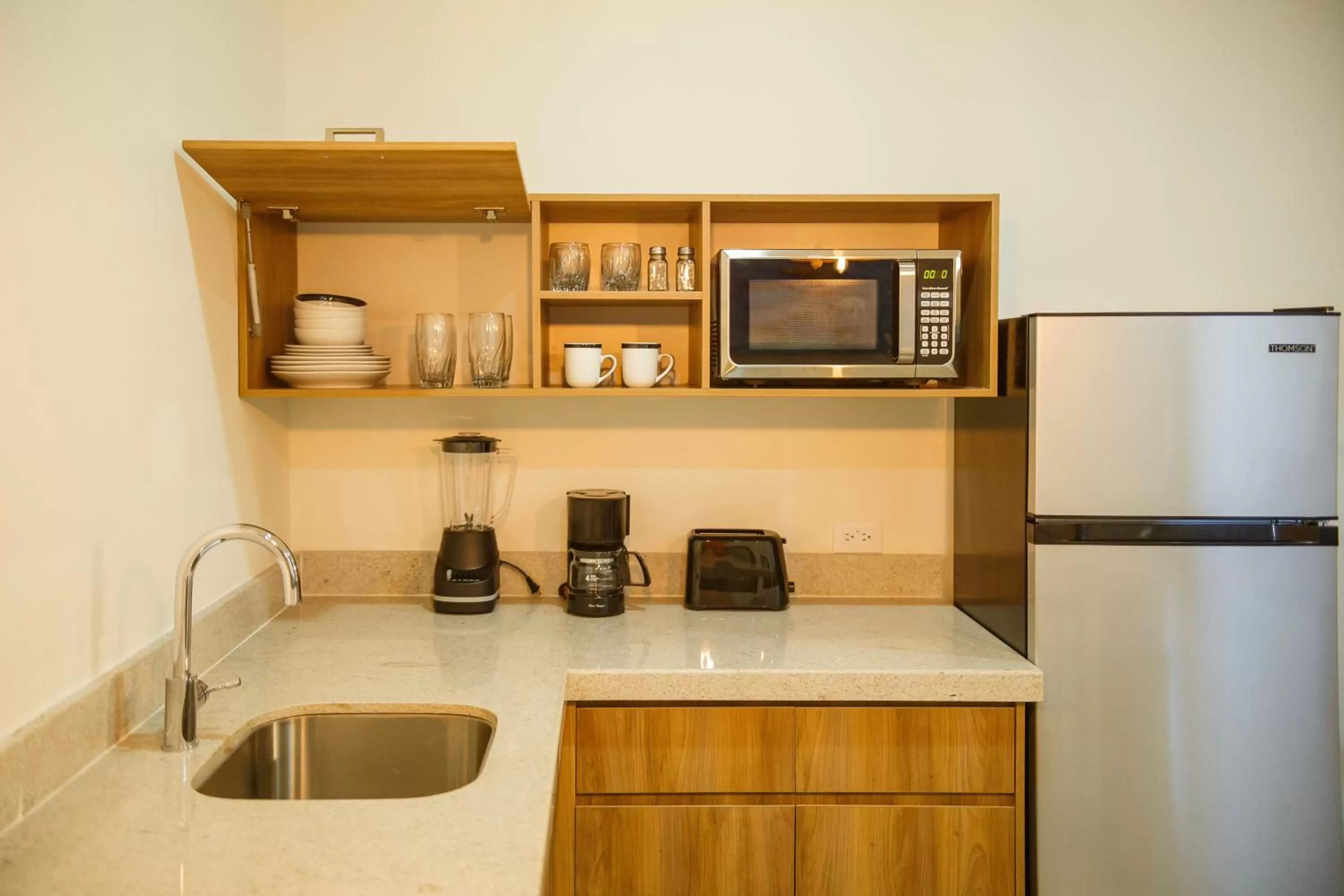Kitchen or kitchenette in Casa Maria Boutique Hotel