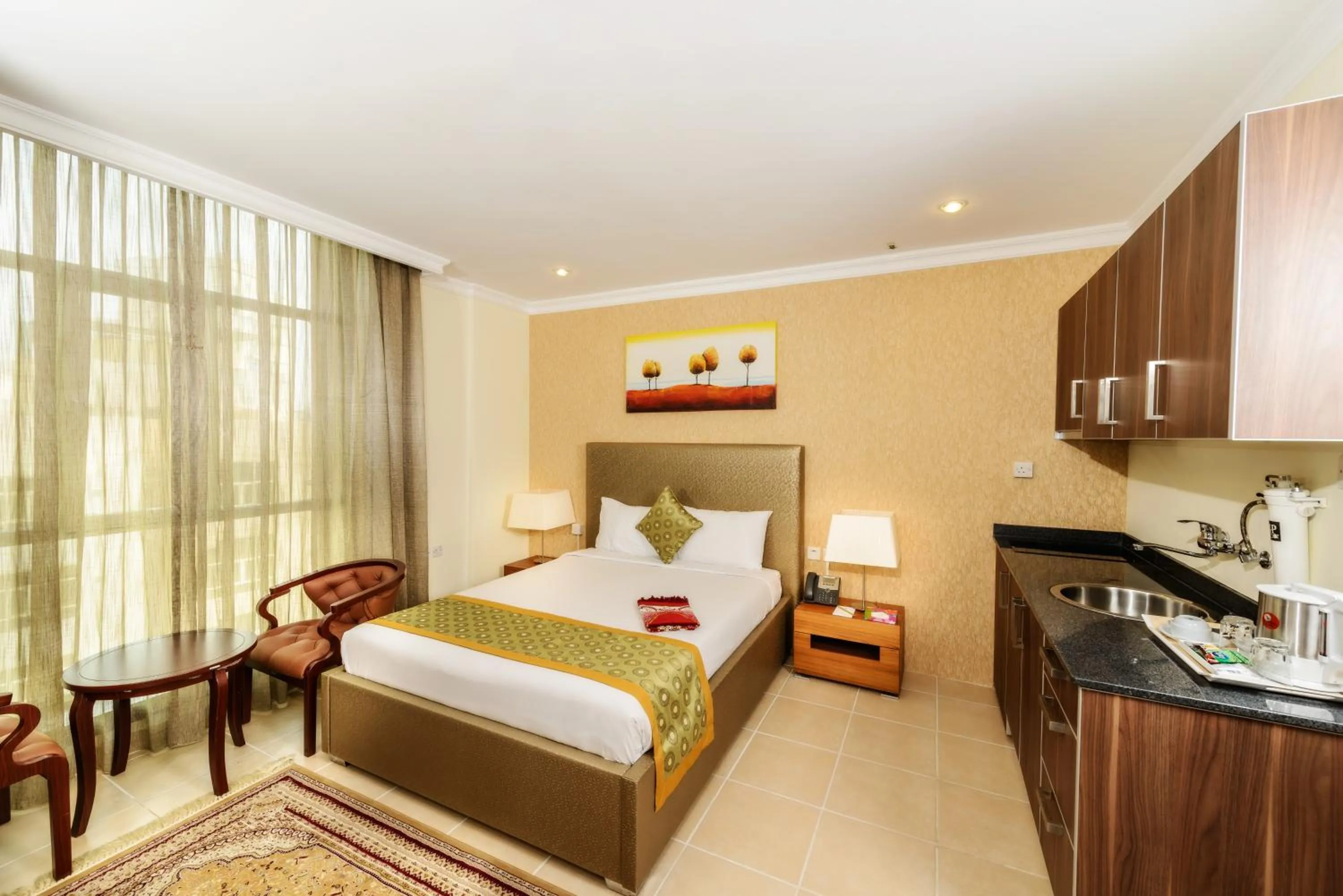 Bed in Bravo Royal Hotel Suites