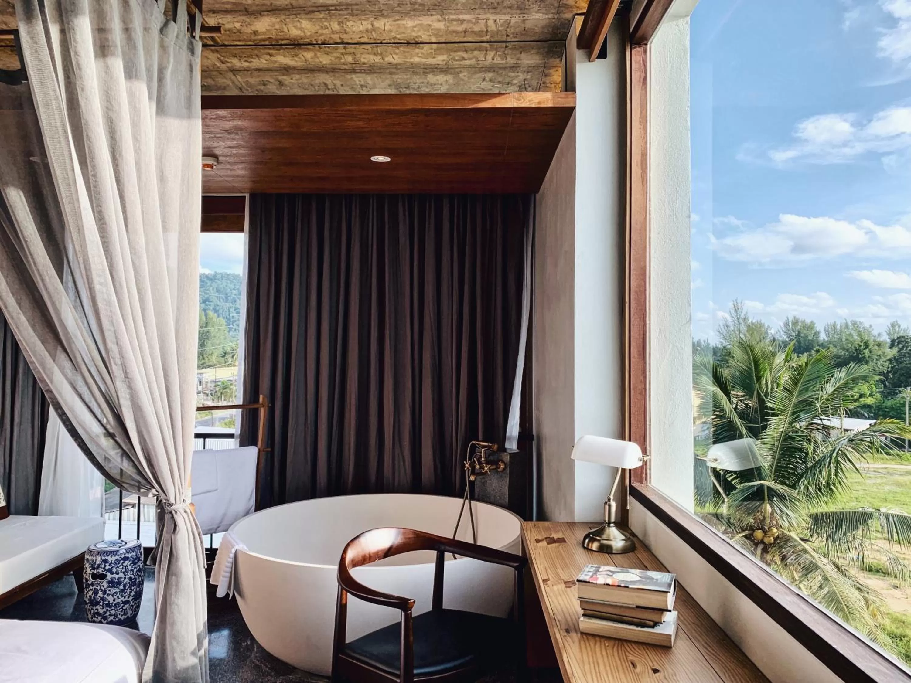 Seating area in Hotel Gahn Khao Lak