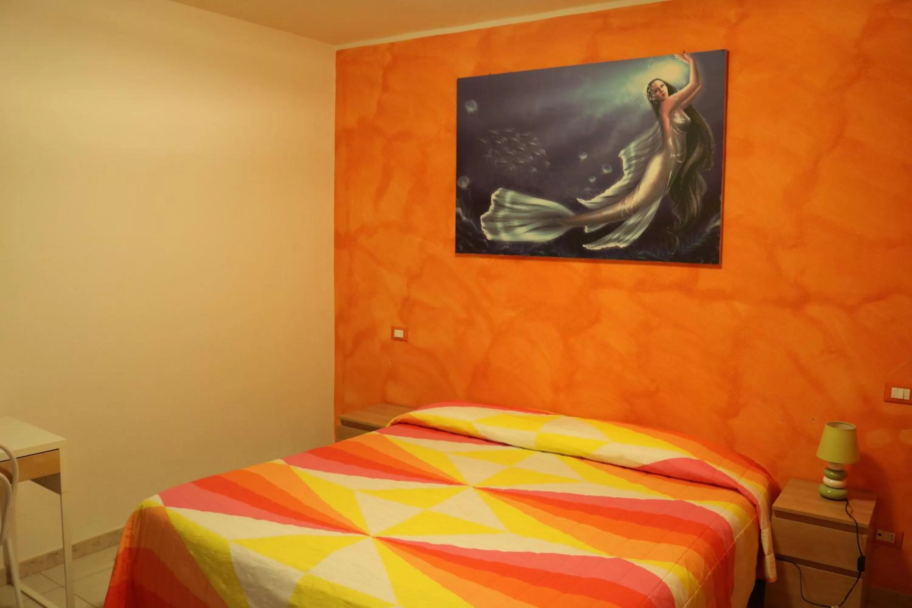 Bed in Le Sirene Bed and Breakfast