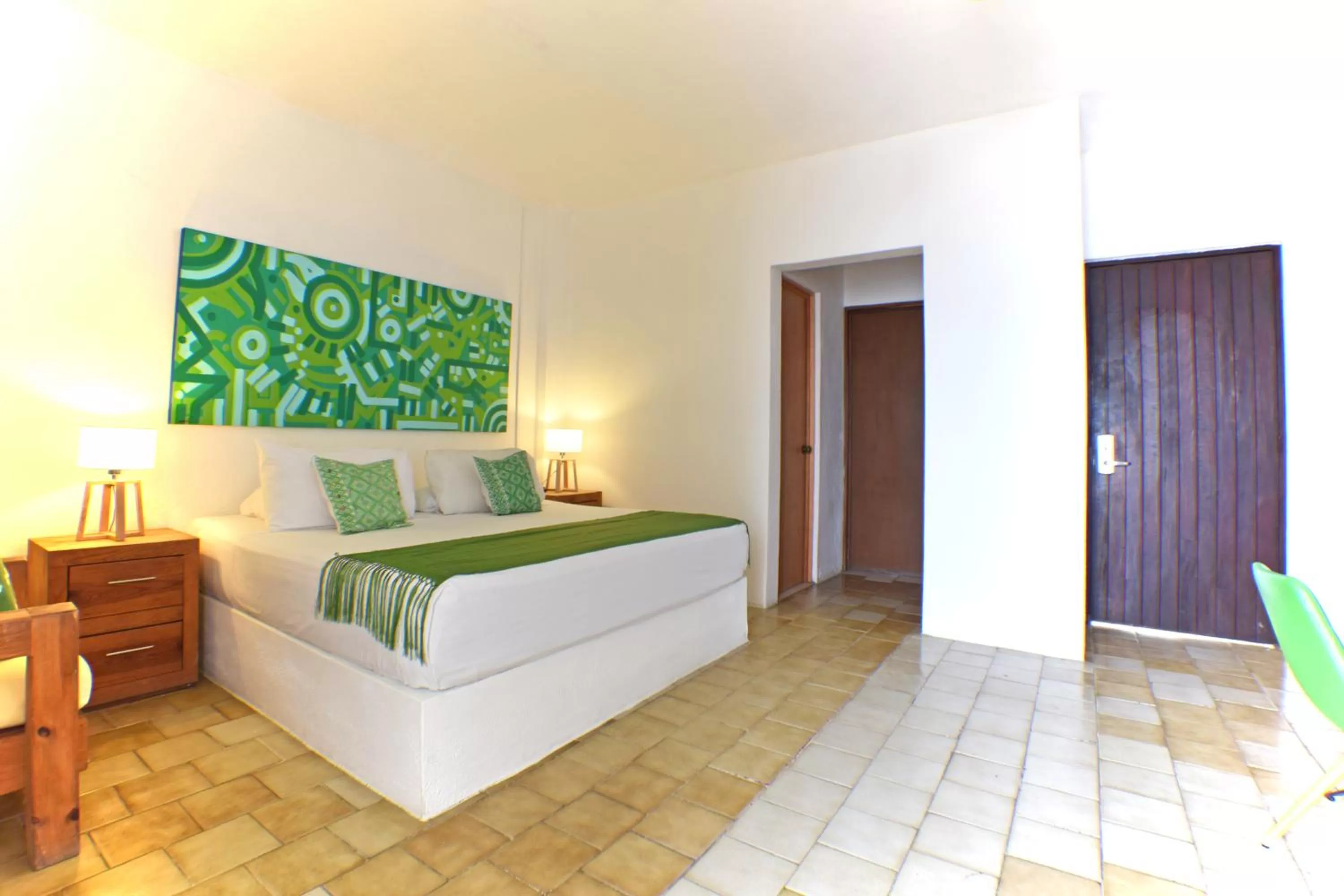Photo of the whole room, Bed in Emperador Vallarta Beachfront Hotel and Suites