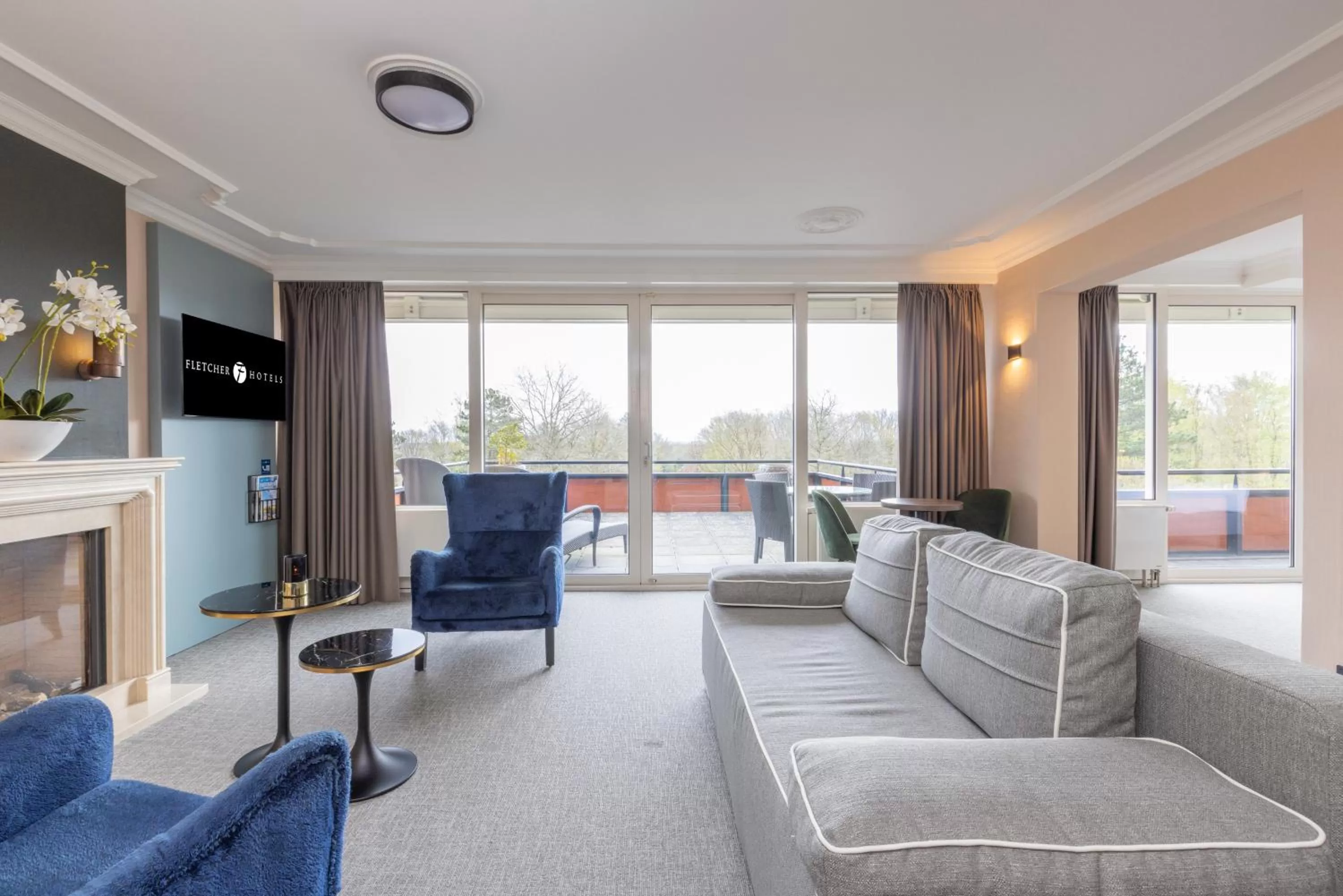 Seating area in Fletcher Familiehotel De Hunzebergen