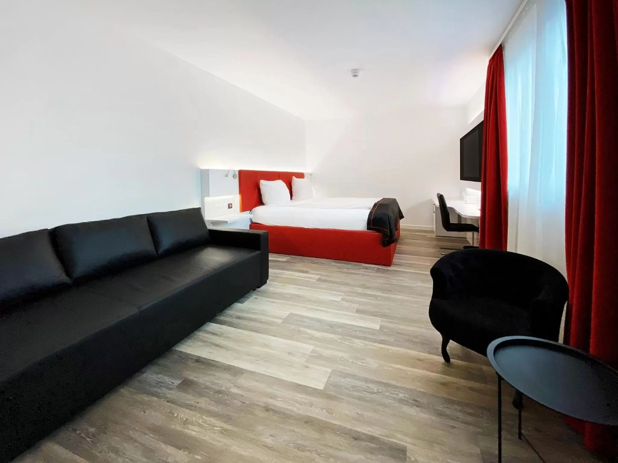 Photo of the whole room in DORMERO Hotel Darmstadt