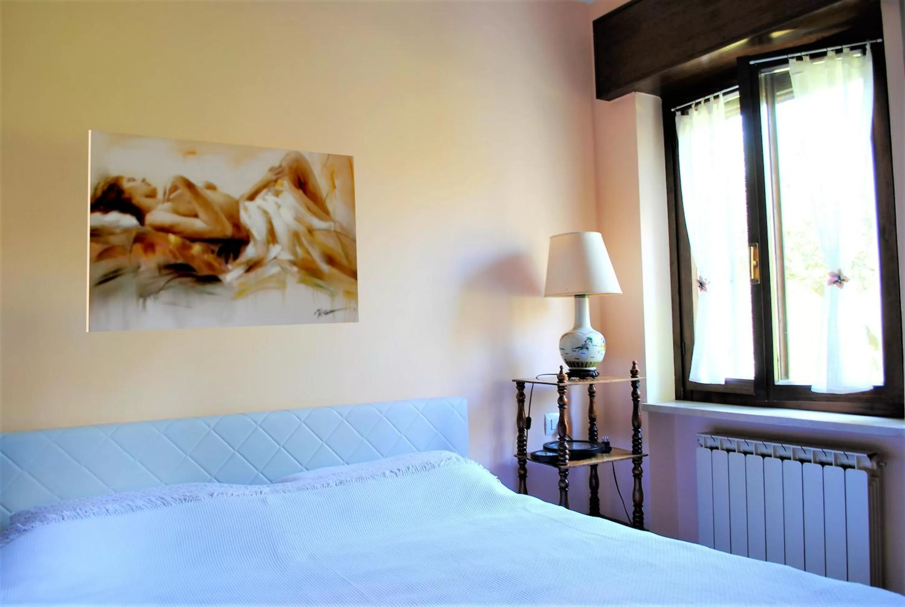 Photo of the whole room, Bed in AGRITURISMO MELOGRANO D'ORO