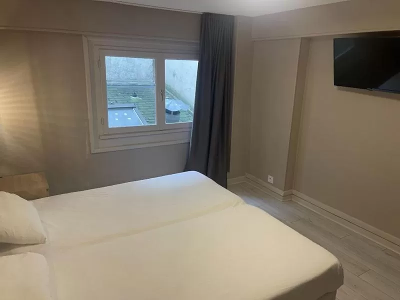 Bed in Hotel de la Gare