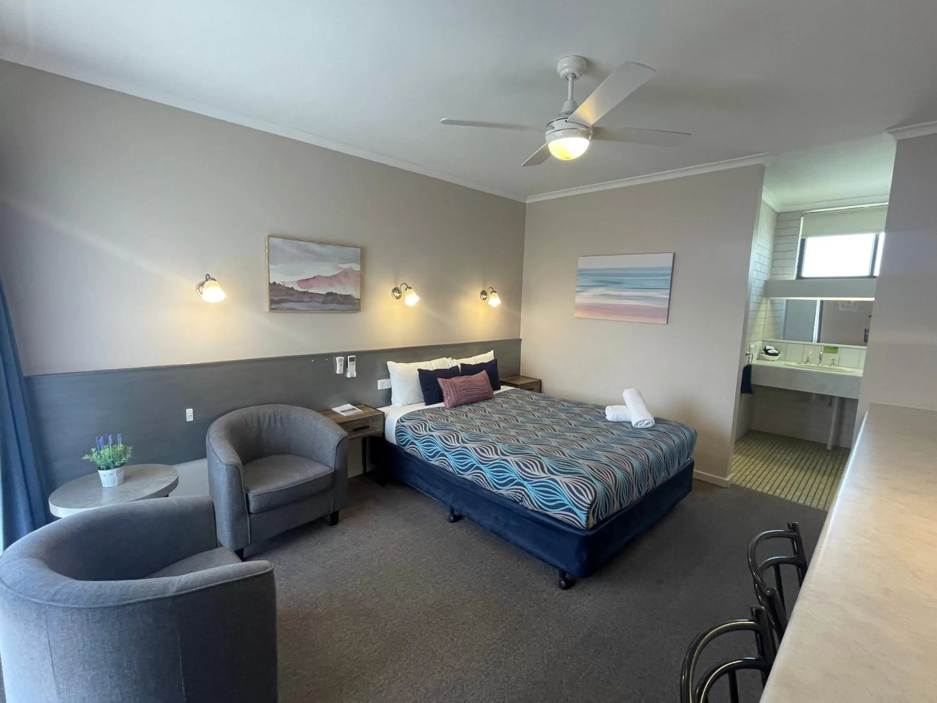 Bed in Paddlewheel Motel