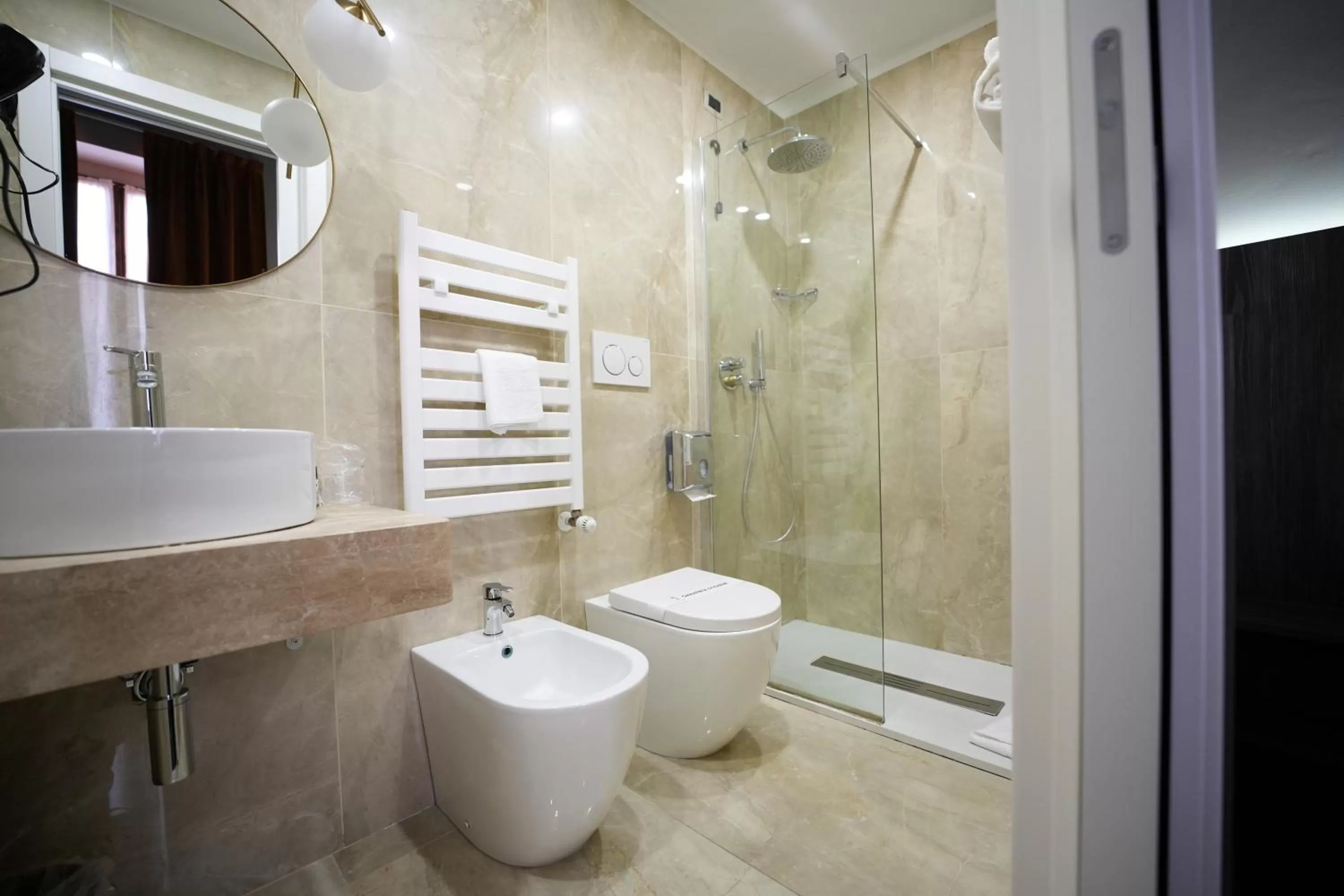 Bathroom in Hotel Urbani