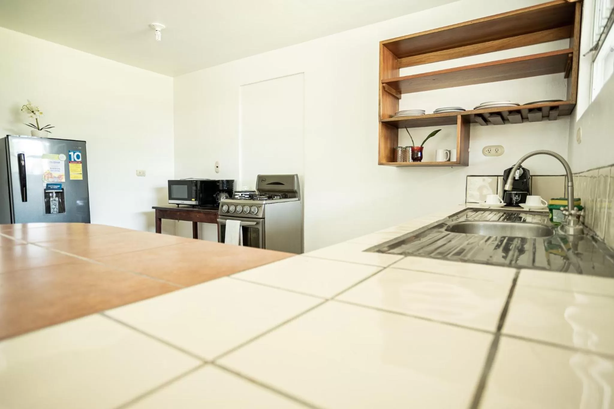 Kitchen or kitchenette in Hotel El Rancho