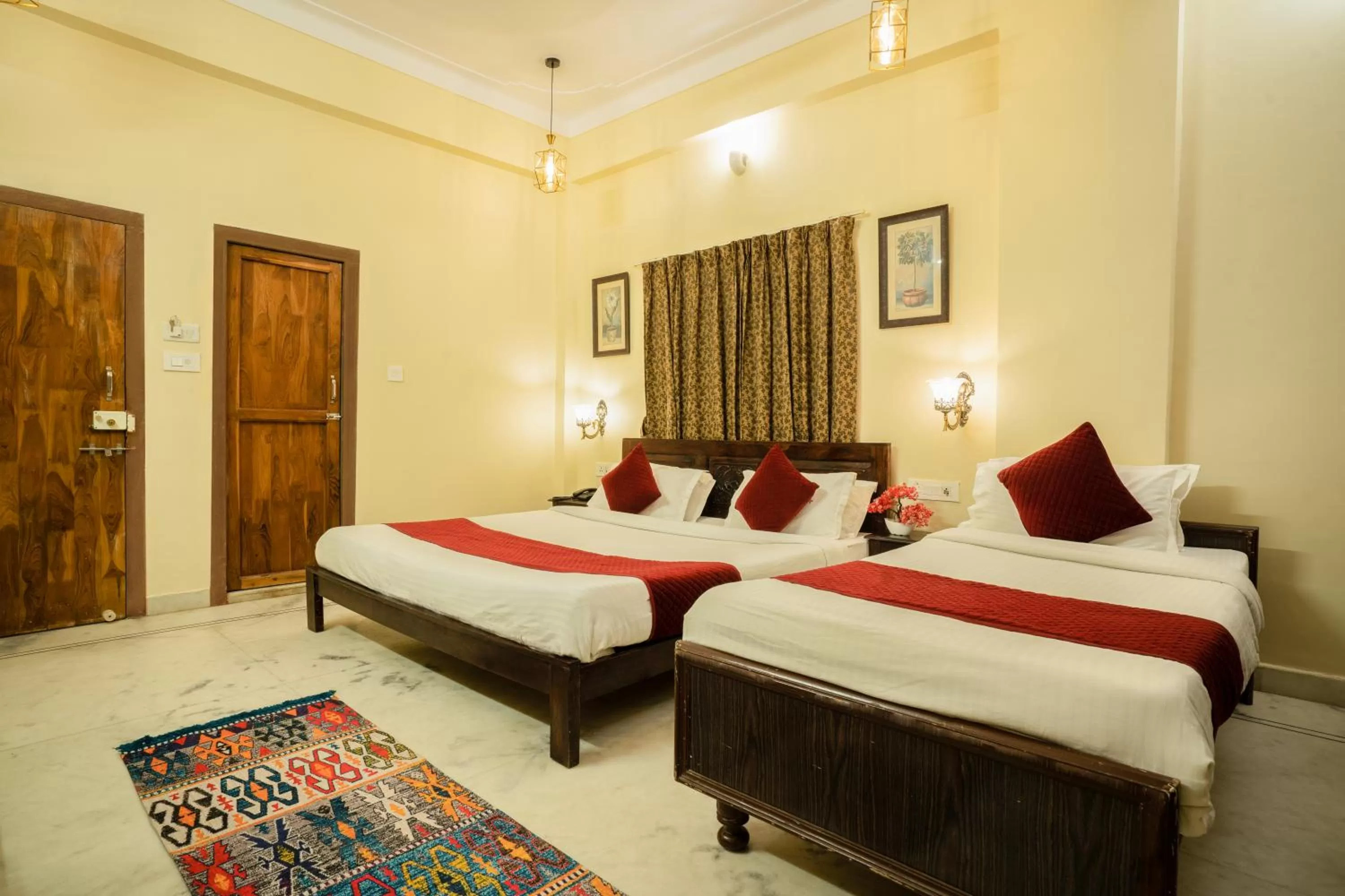 Bed in Tripli Hotels Shiv Villas