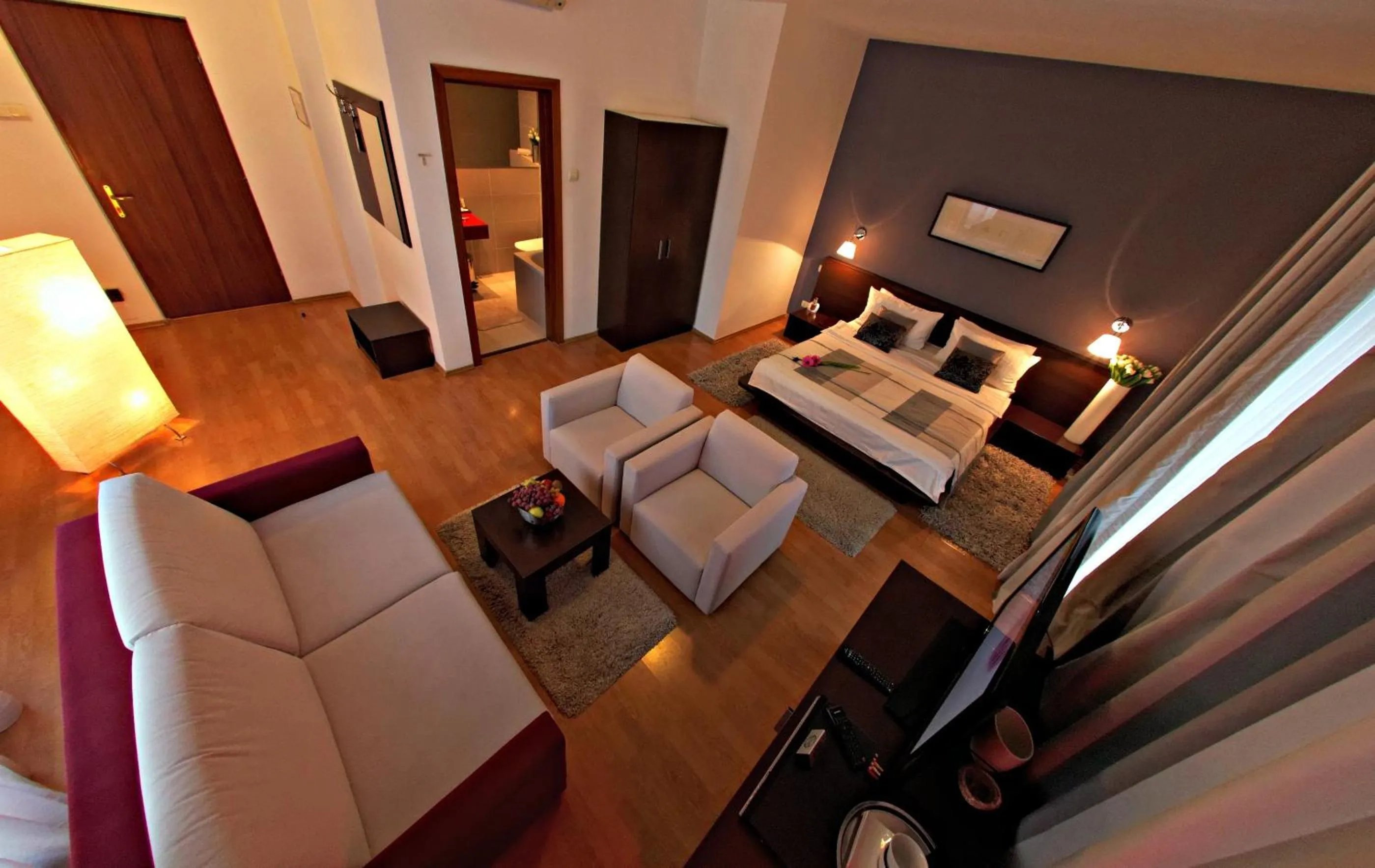 Photo of the whole room, Bed in Unique Boutique