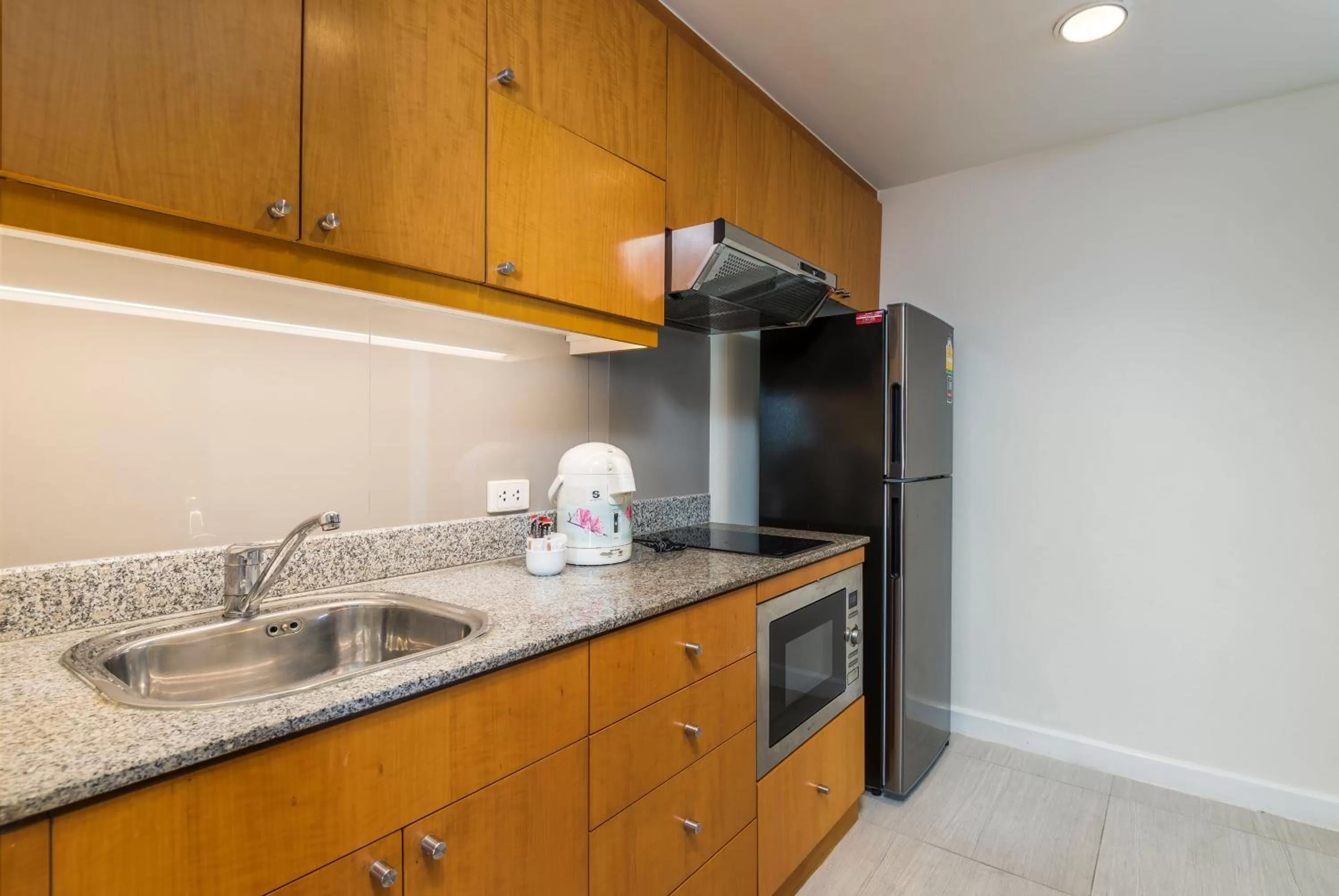 Kitchen or kitchenette in Chatrium Sathon Bangkok