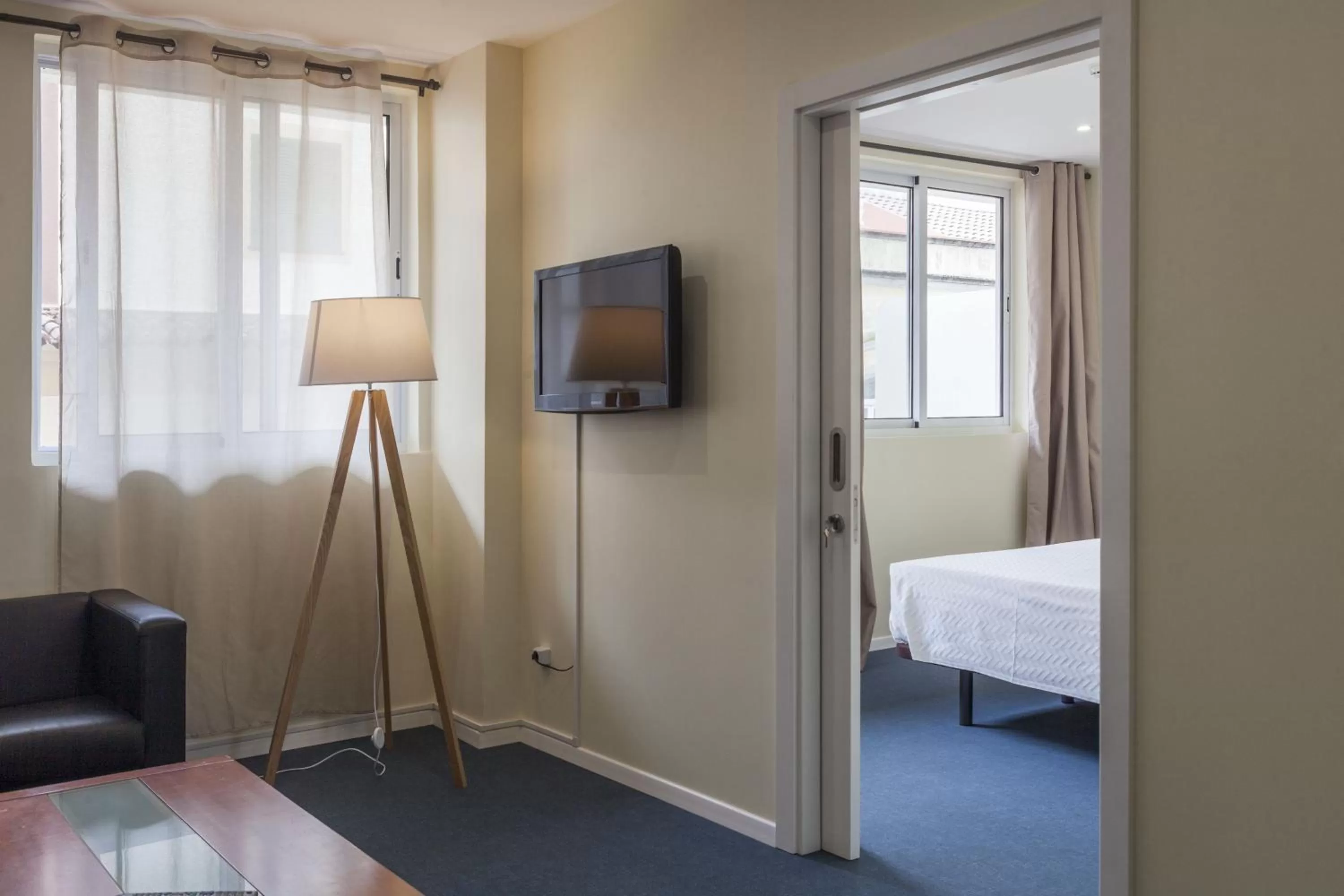 Communal lounge/ TV room, Bed in Hotel Sete Cidades