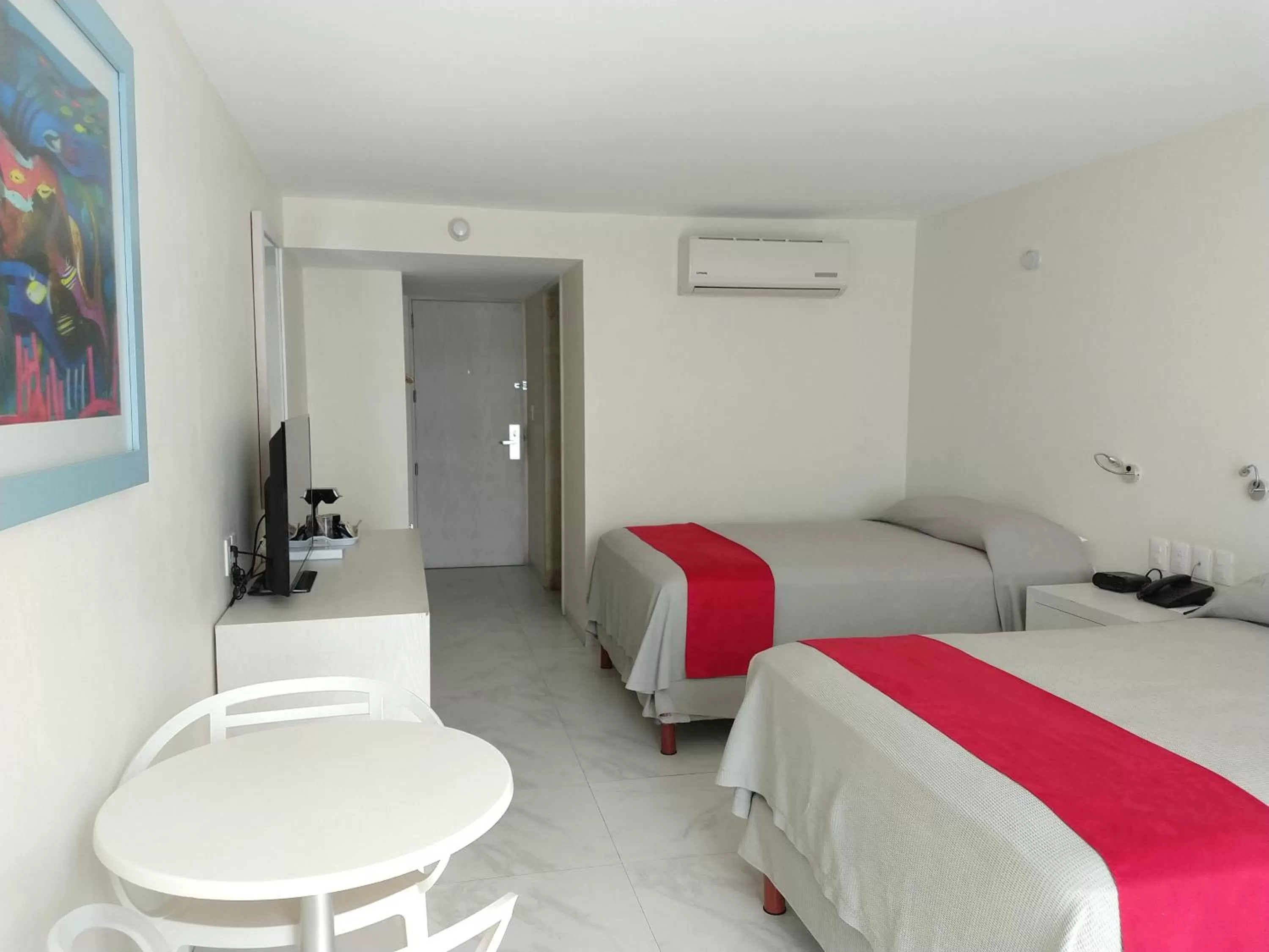 Photo of the whole room, Bed in We Hotel Acapulco