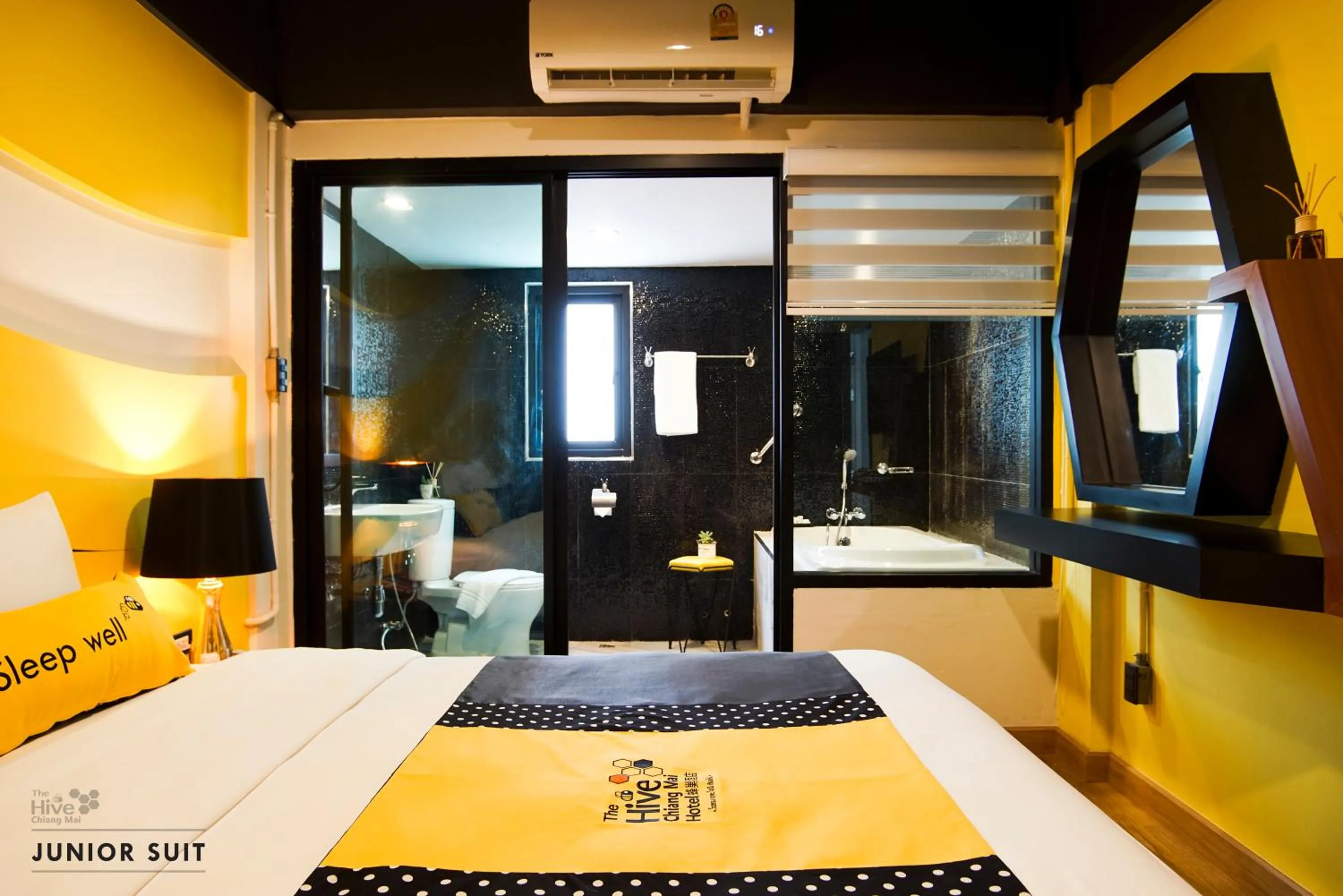 Bed in The Hive Chiang Mai Hotel