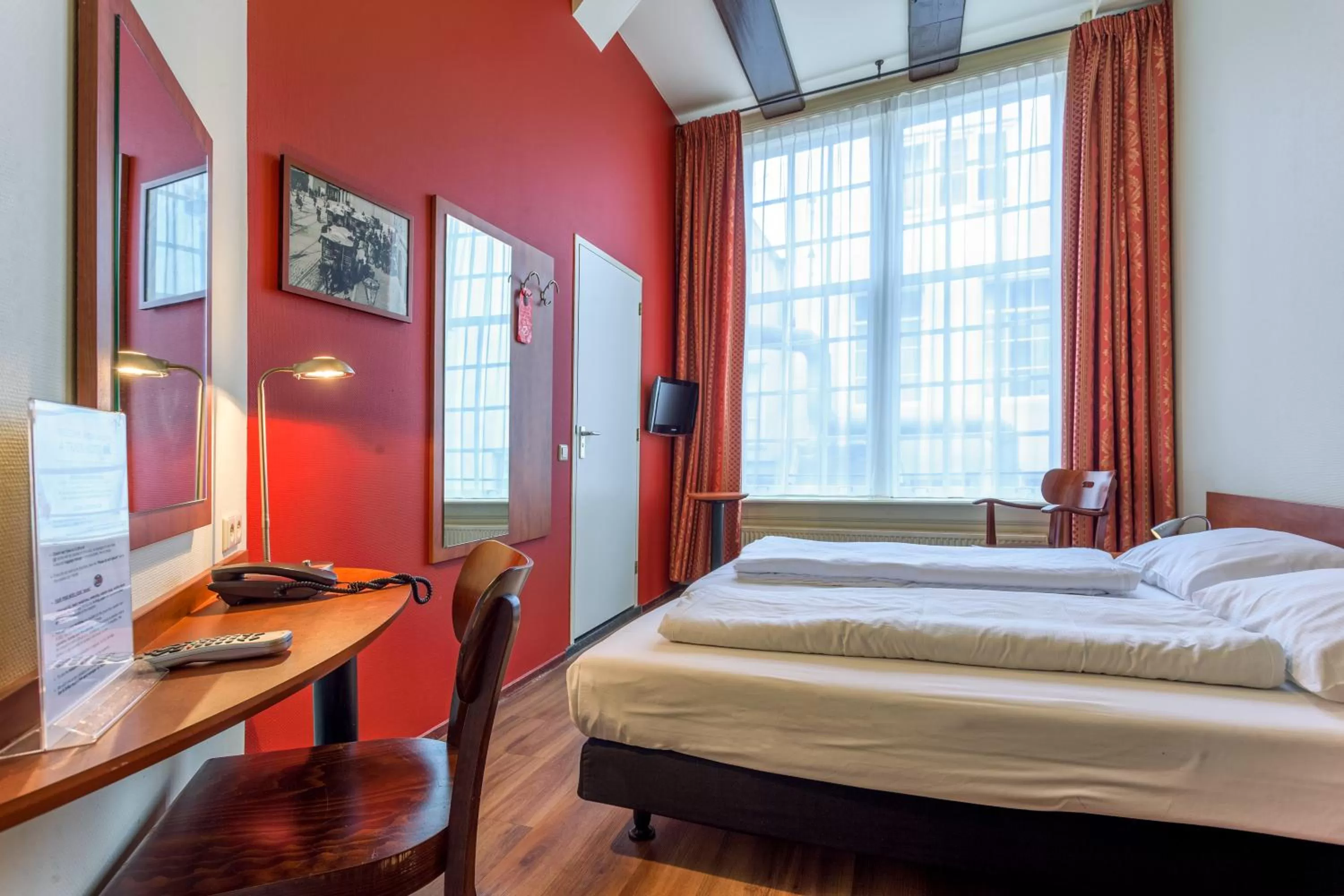 Bed in A-Train Hotel