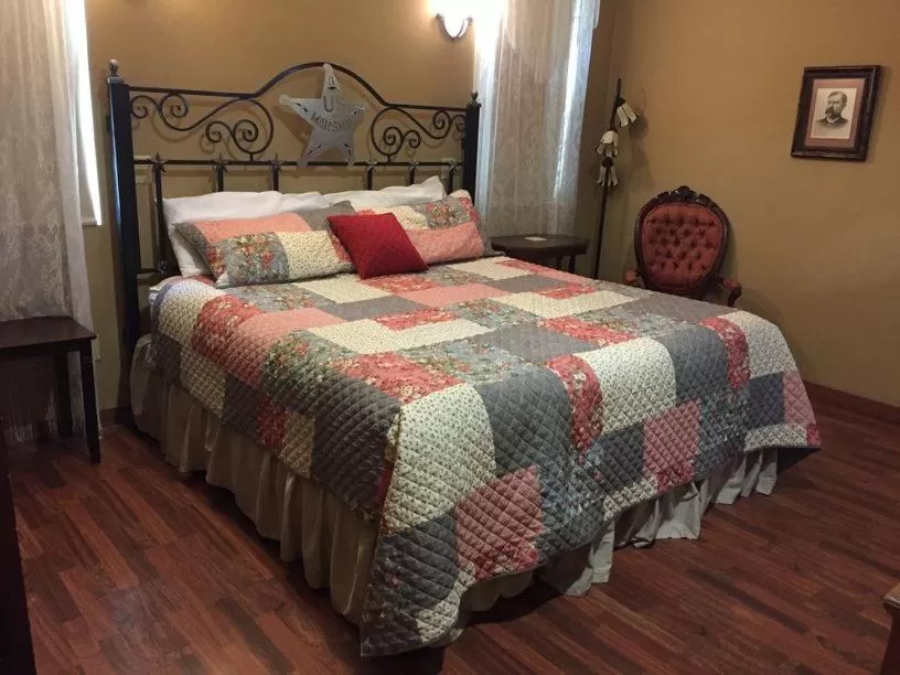 Bed in Virgil's Corner B & B