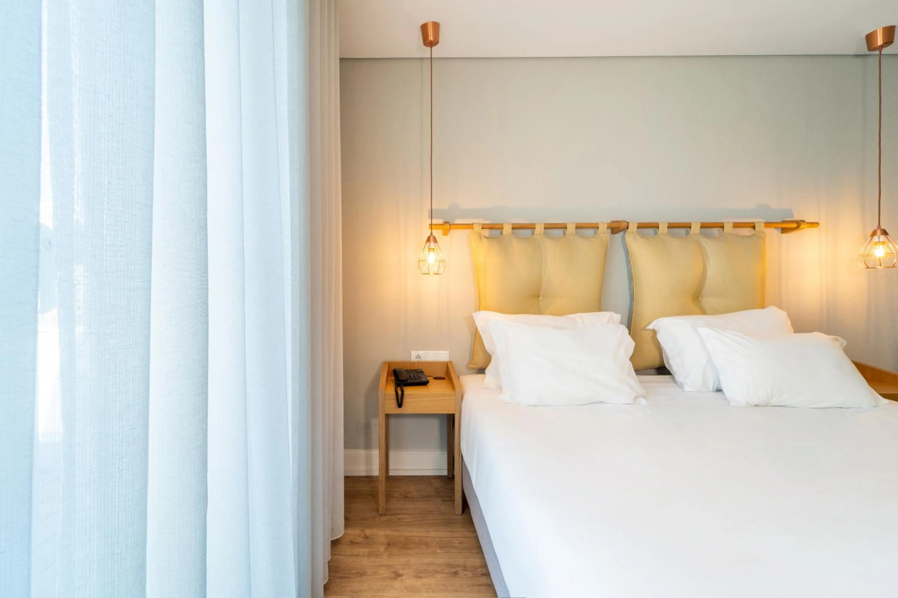 Bed in The Rex Hotel Porto