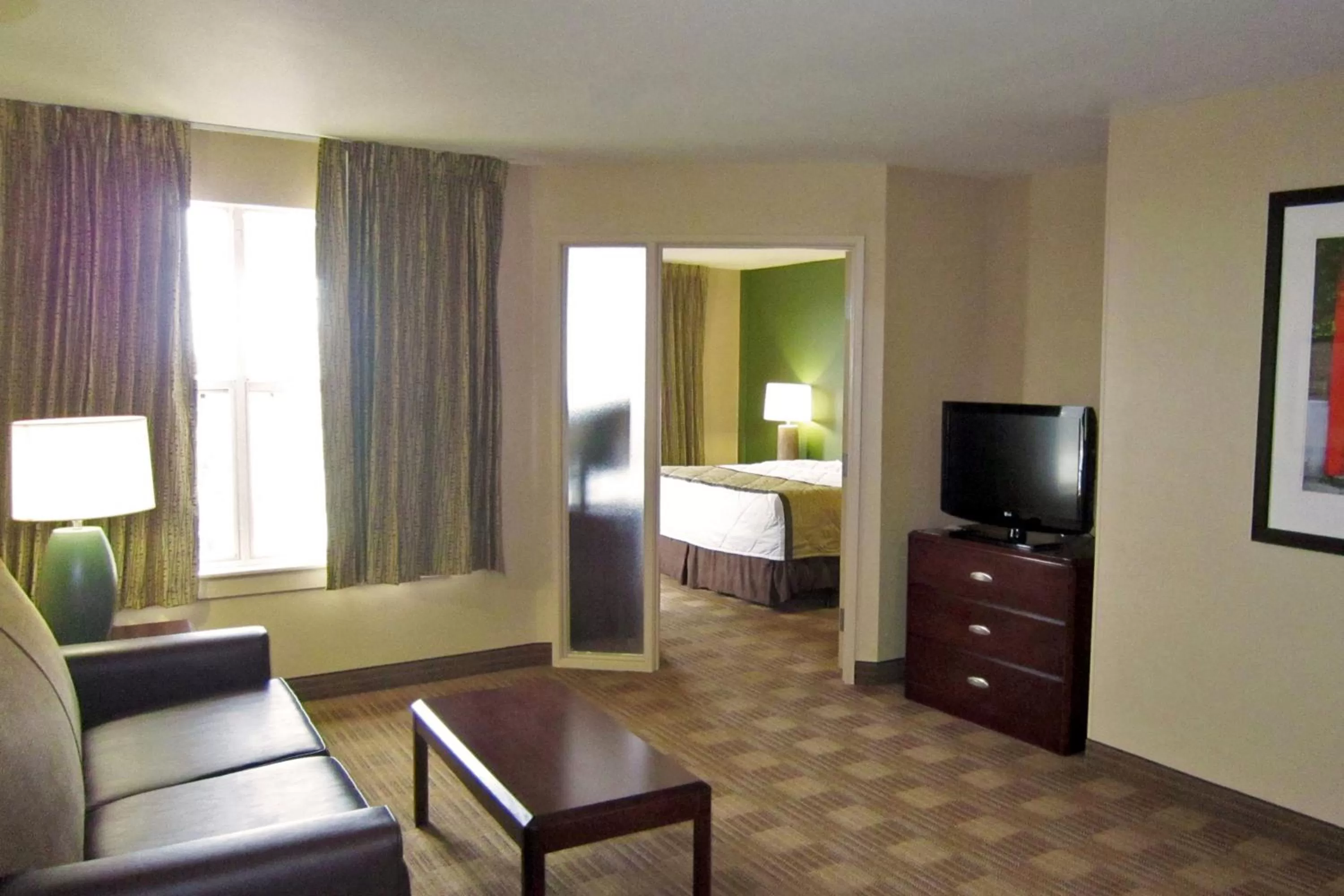 Seating area, Bed in Extended Stay America Suites - Dallas - Plano