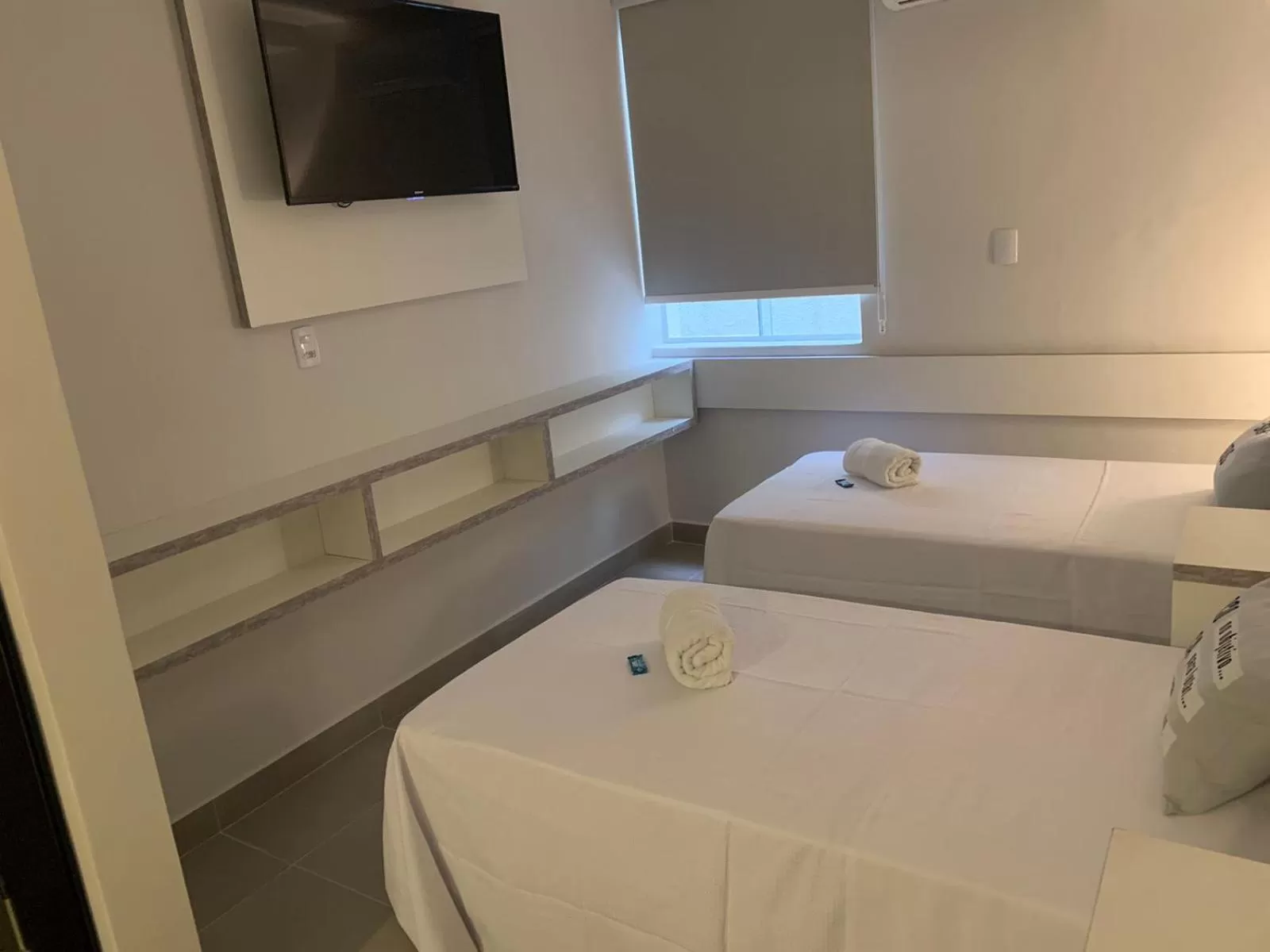 Bed in Hotel Dois Irmãos