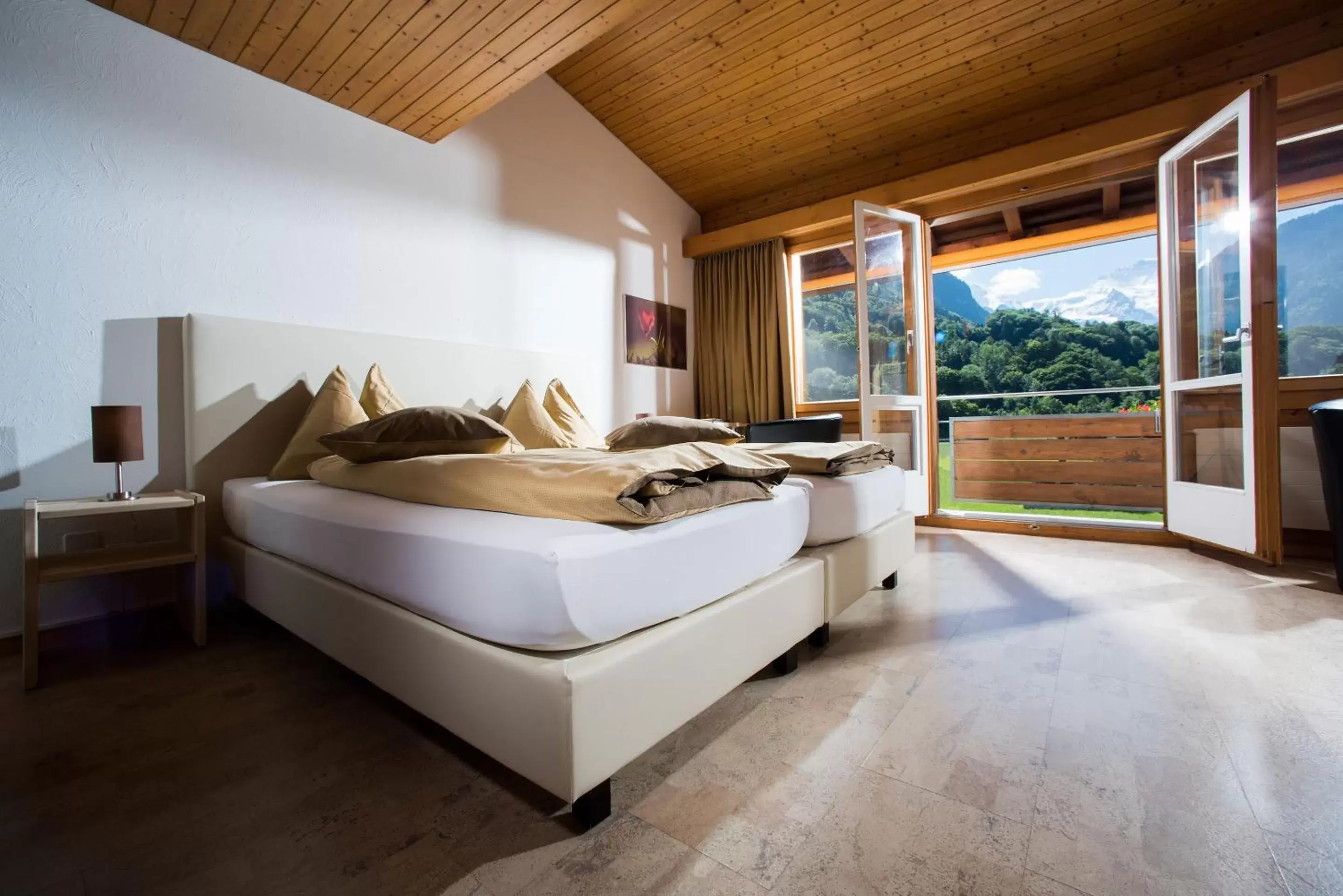 Panorama Triple Room with Jungfrau View in Jungfrau Hotel Panorama Triple Room with Jungfrau View in Jungfrau Hotel