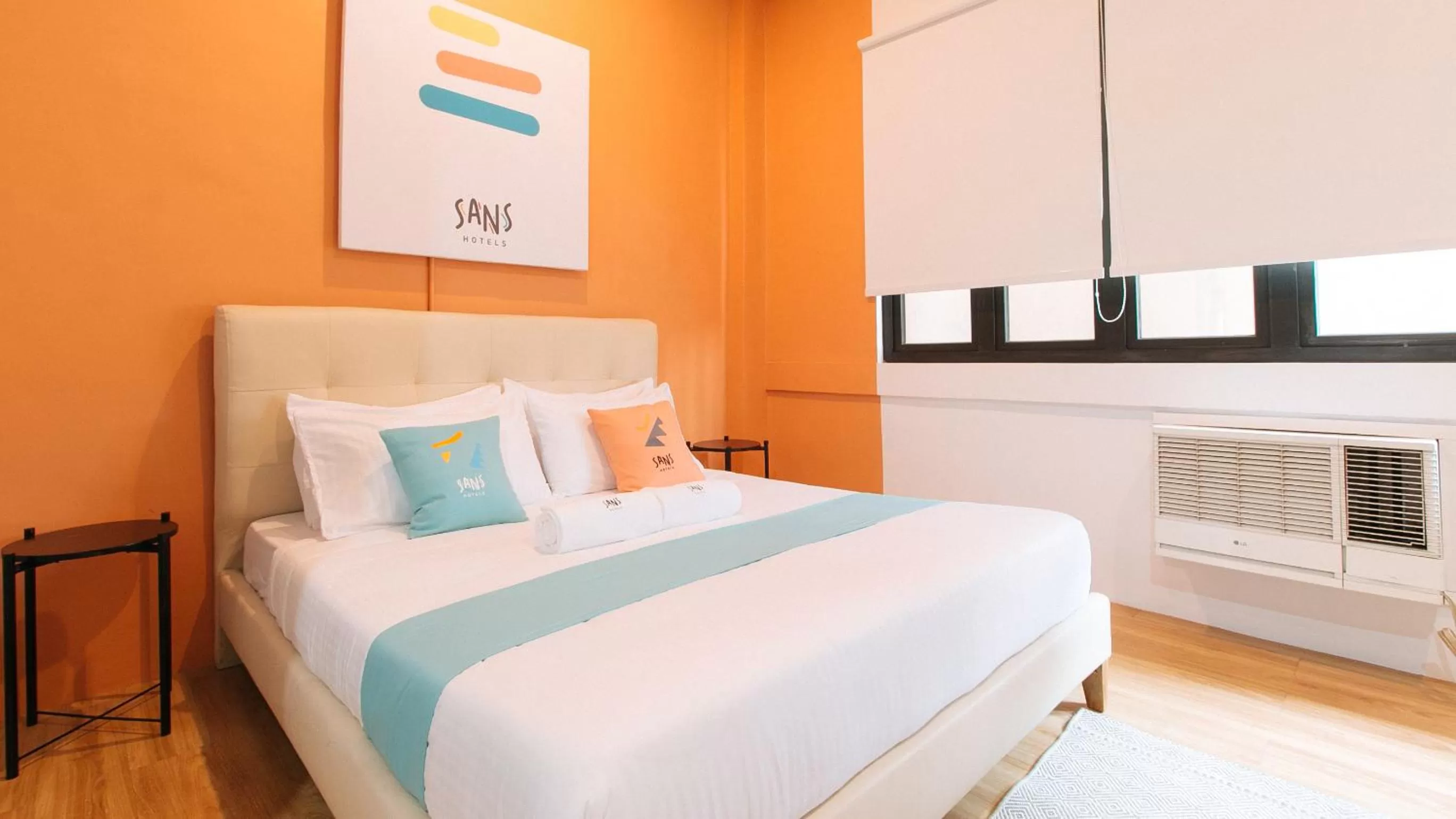 Bed in Sans Hotel Laperal Manila