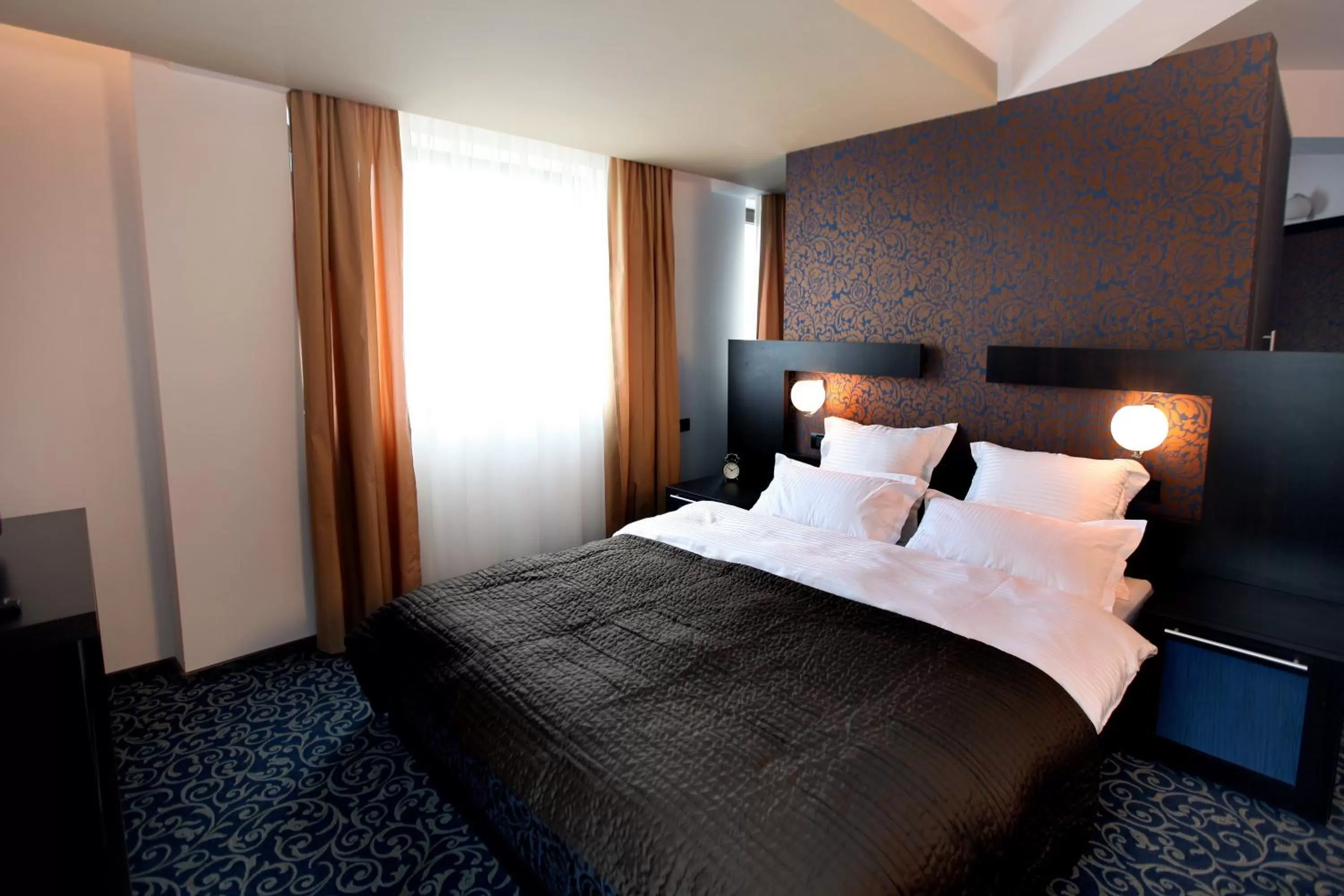 Bed in Ambiance Hotel