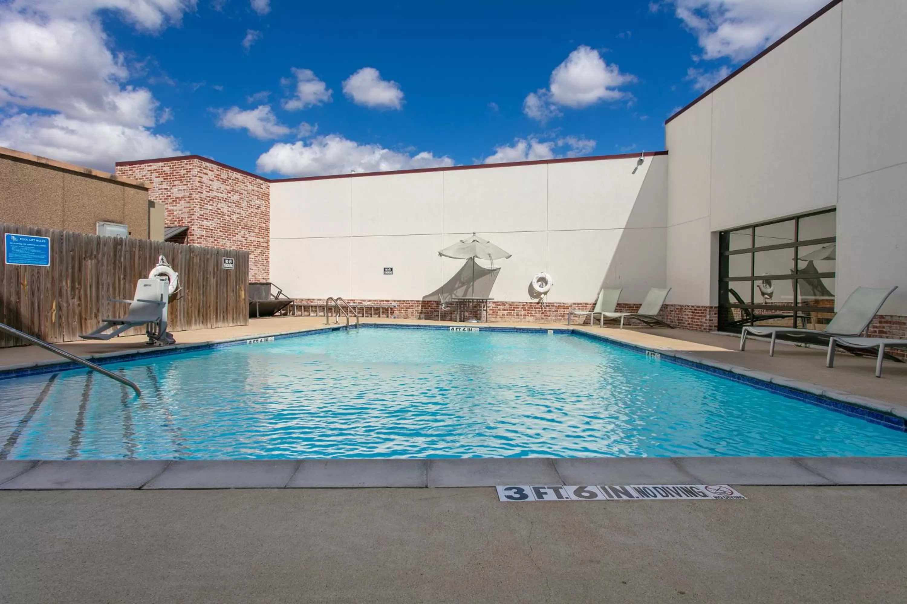 Swimming pool in voco College Station Aggieland by IHG
