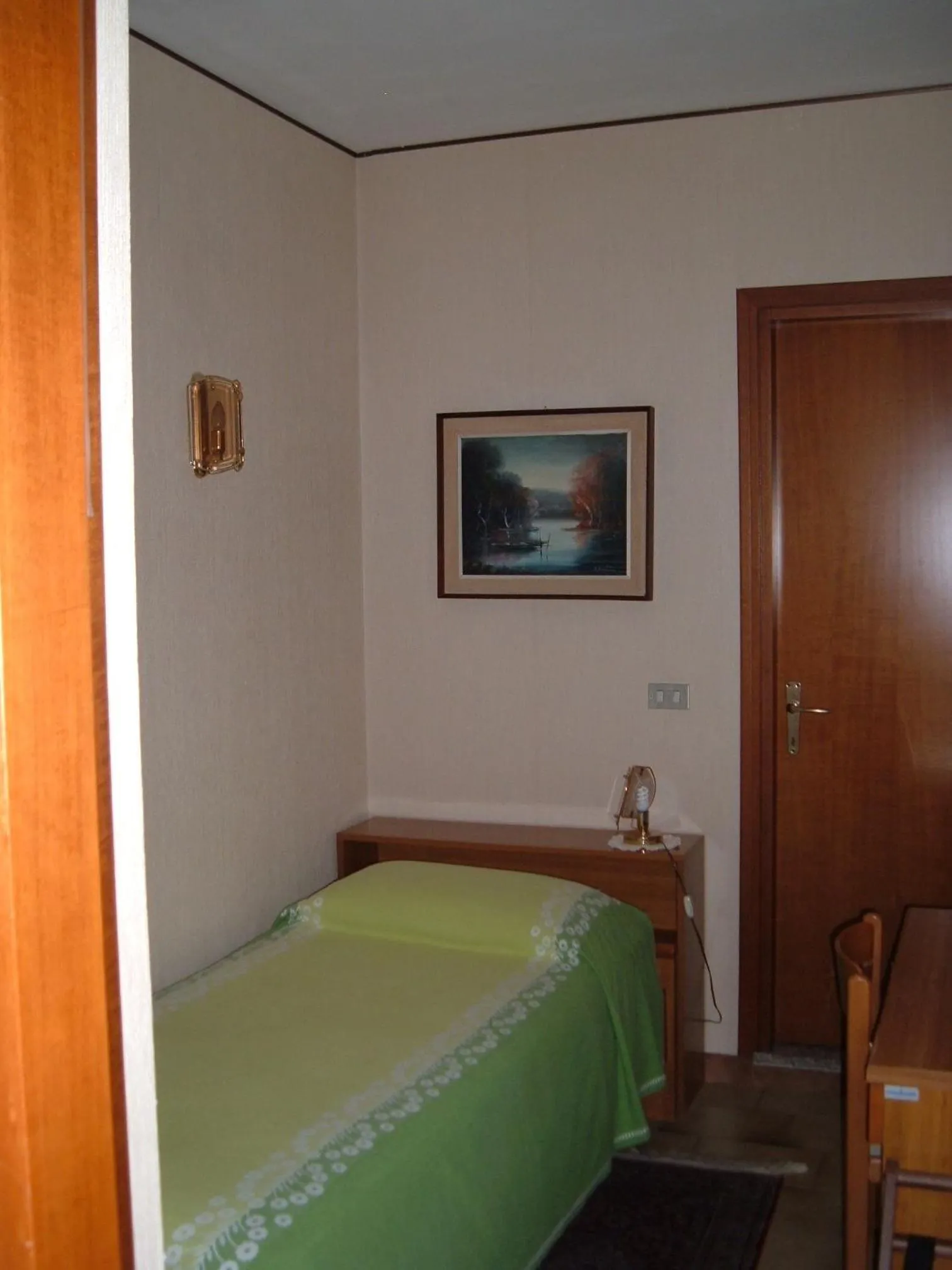 Bed in Albergo Luca