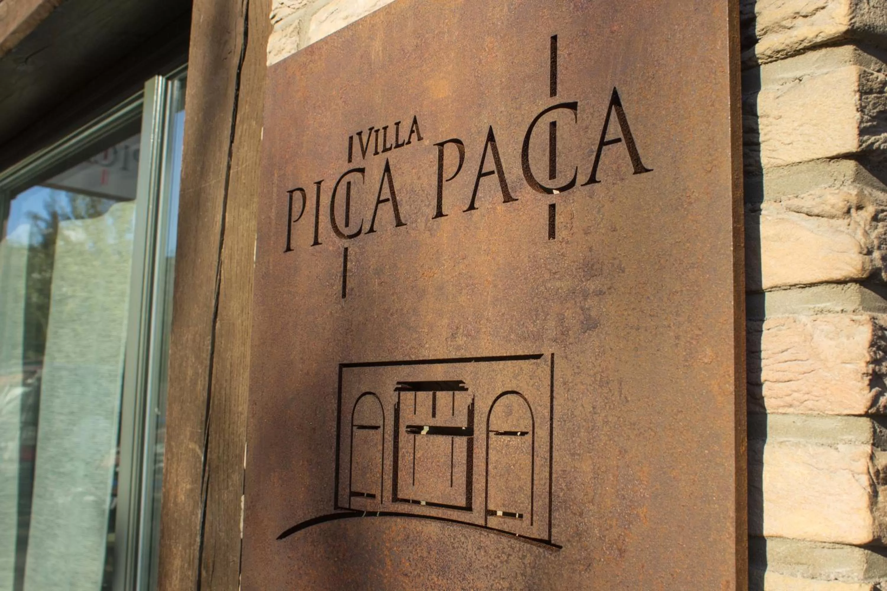 Property logo or sign in Villa Pica Paca - Old Town
