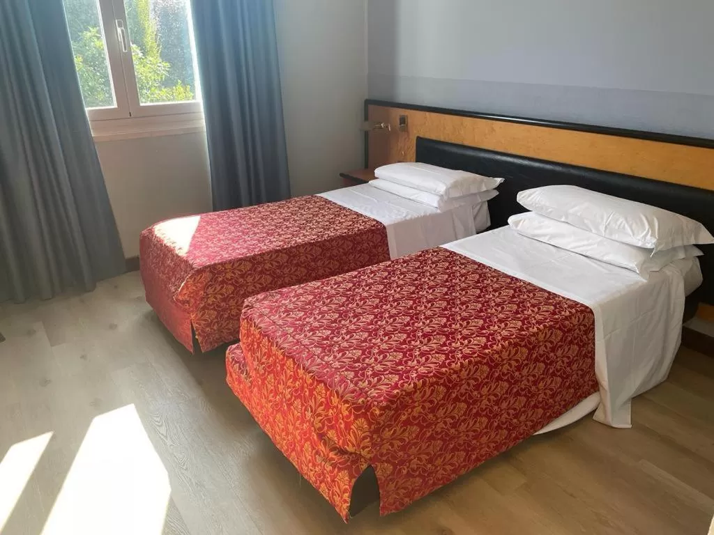 Bed in Art & Hotel Treviolo