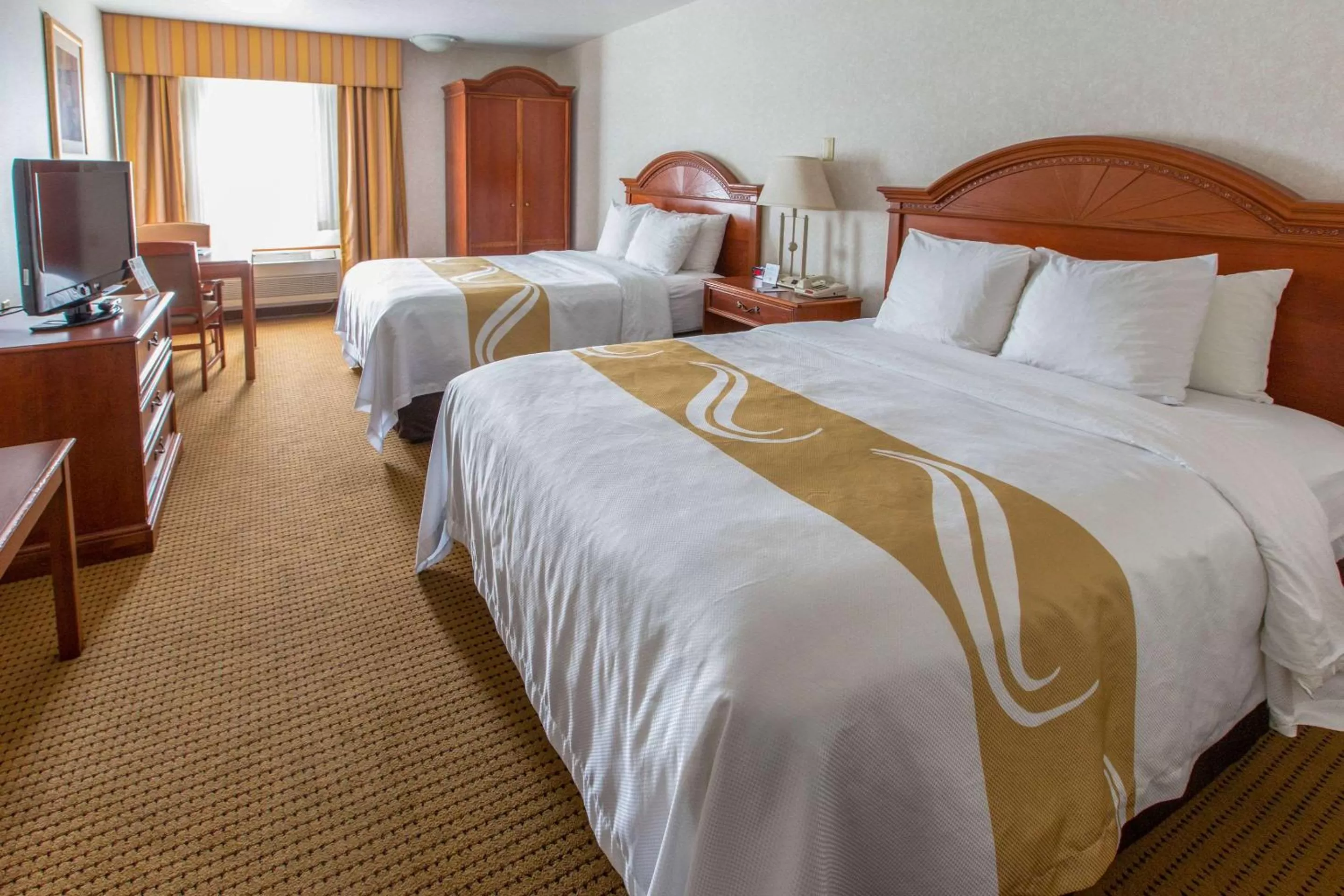 Photo of the whole room, Bed in Quality Inn & Suites University