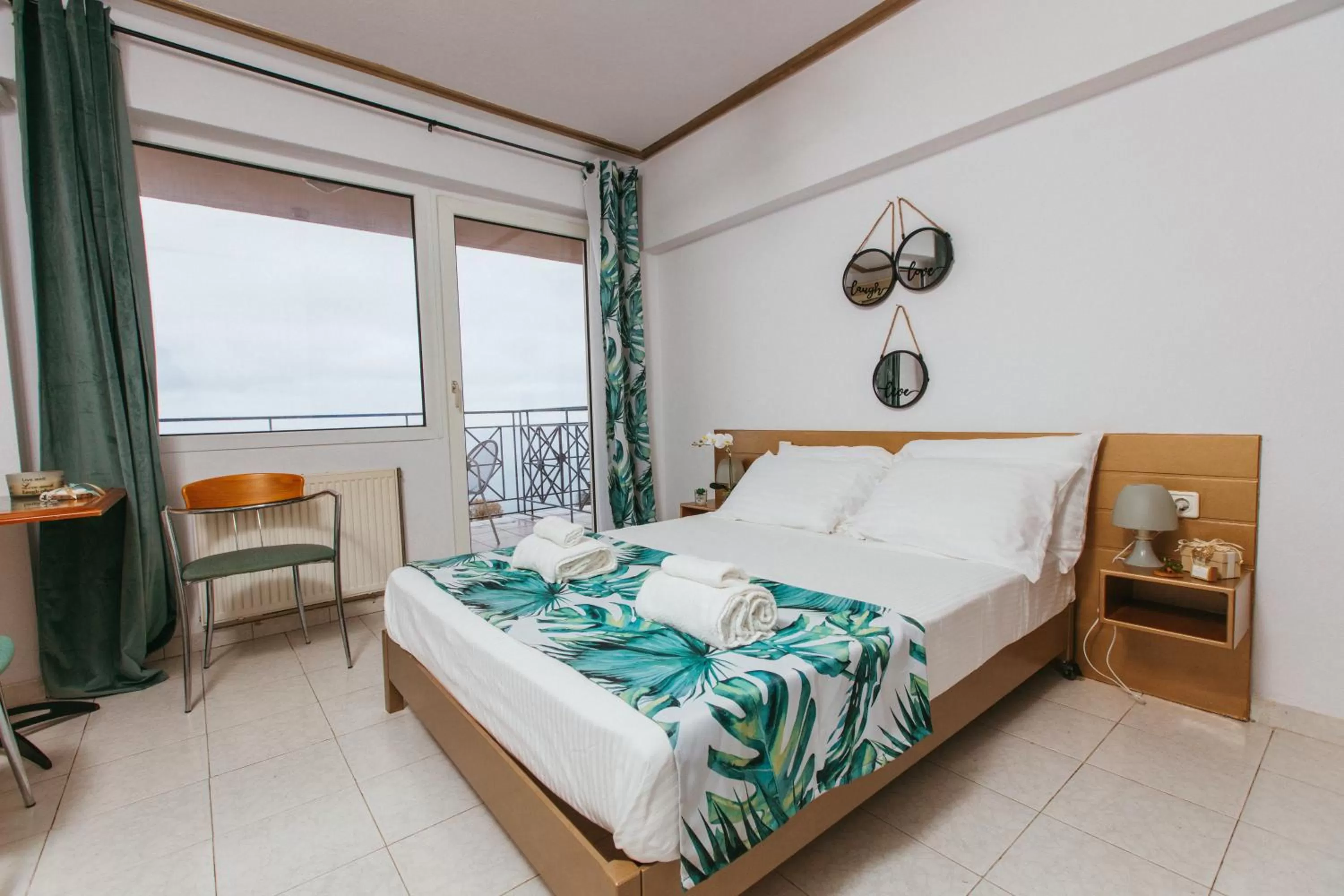 Bedroom in Hotel Christina - Happy Days