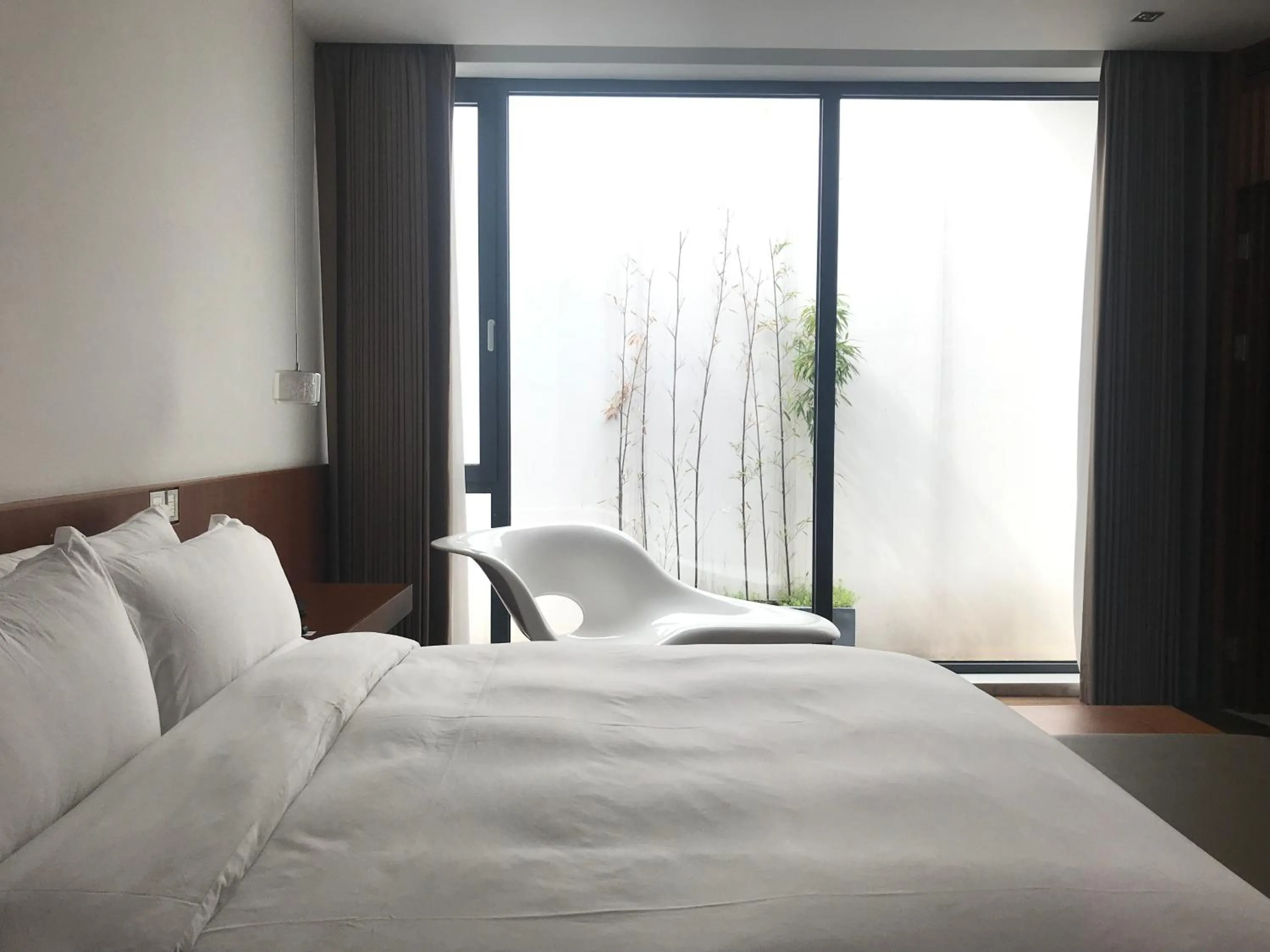 Bed in The Sifang Hotel Nanjing, Autograph Collection