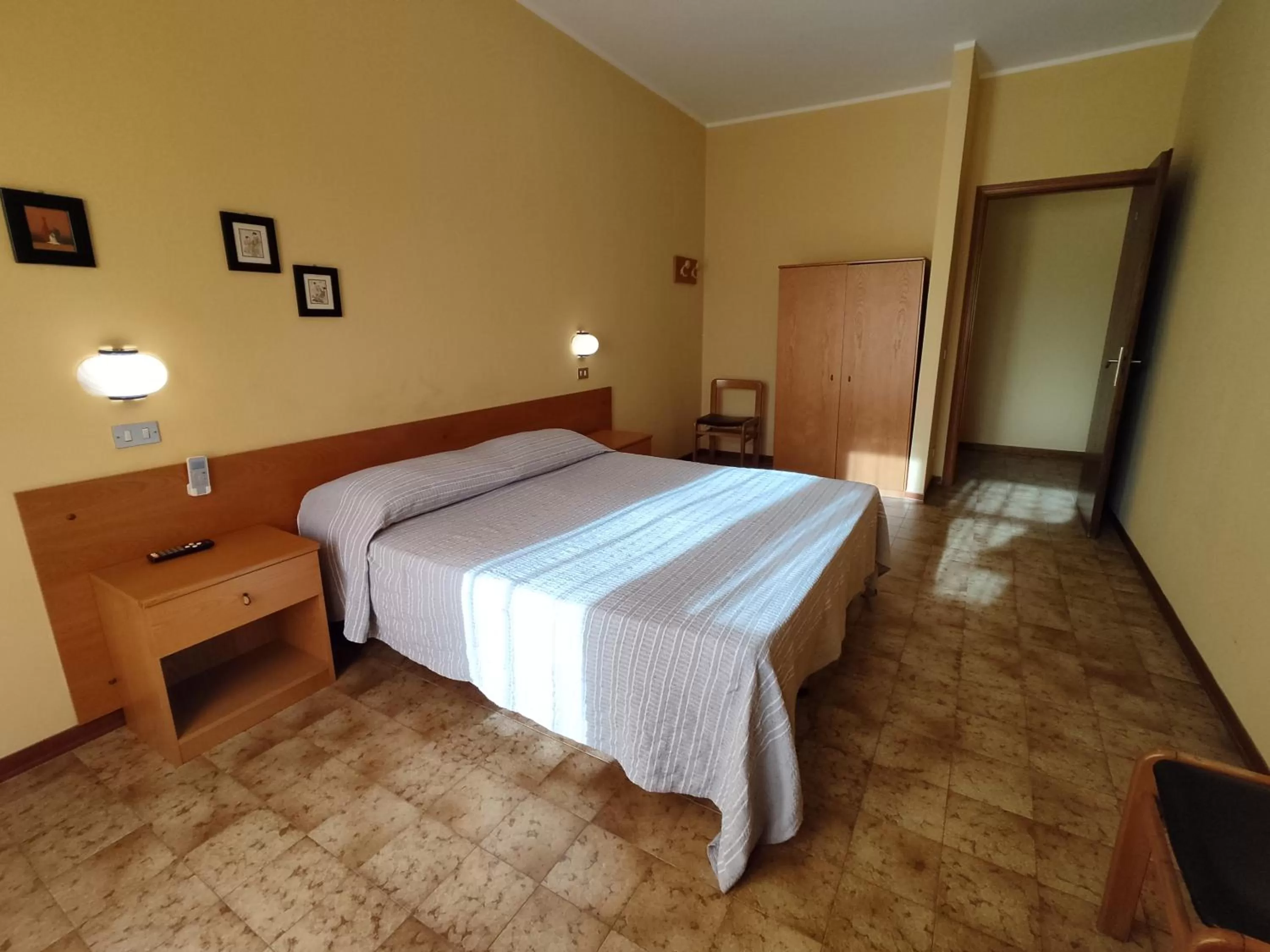 Bed in Hotel Il Dollaro