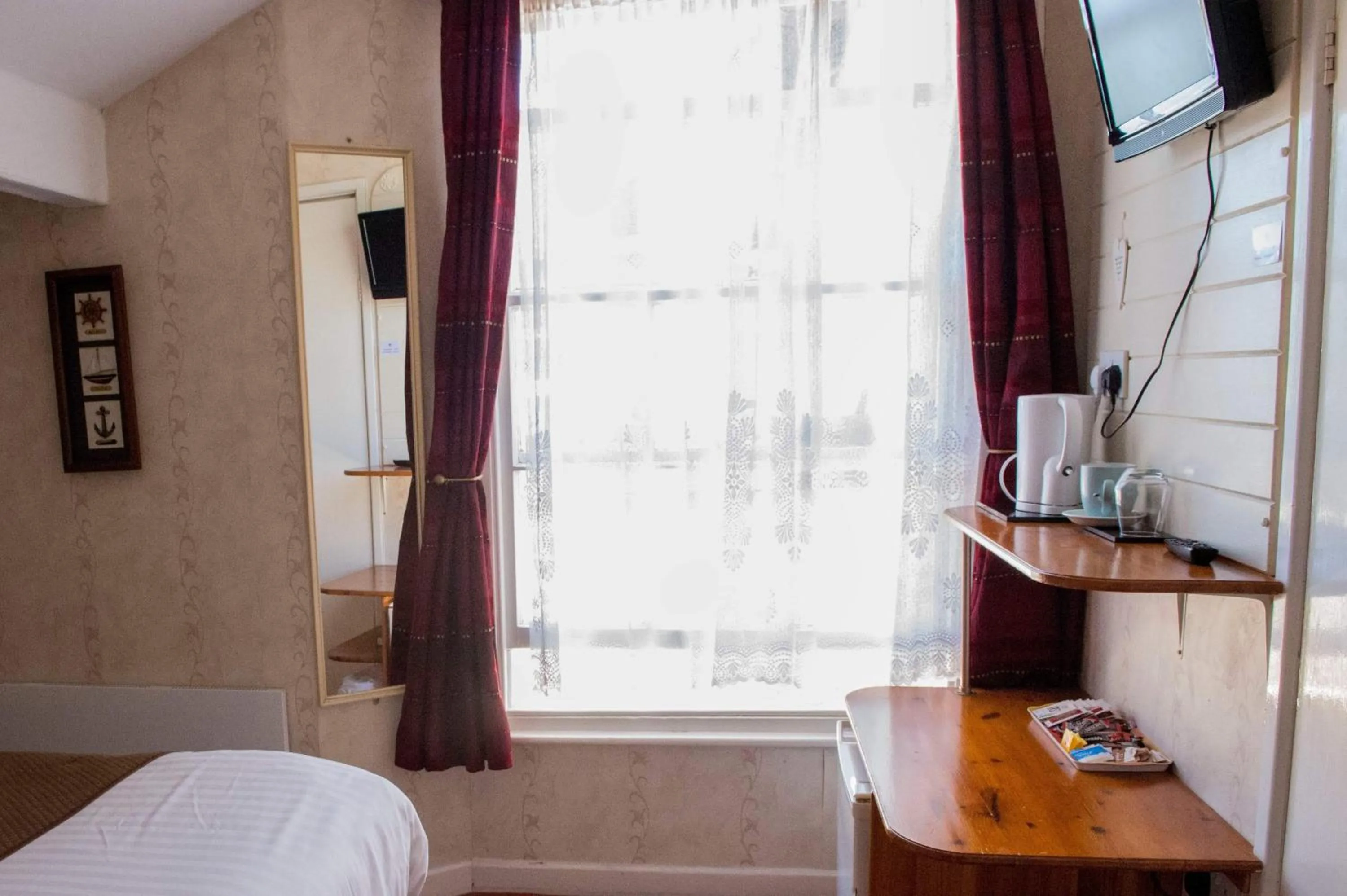 Bed in Poltair Guest House