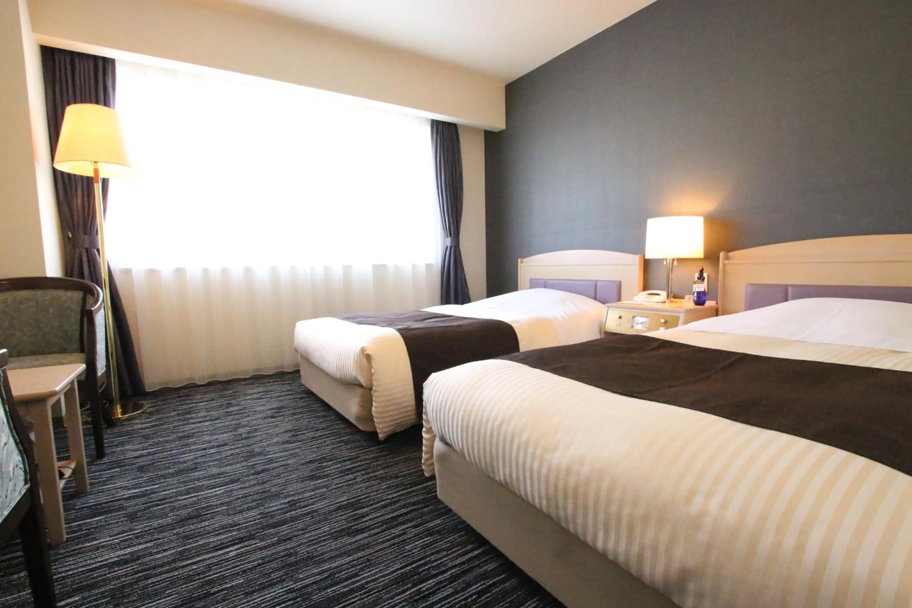 Bathroom, Bed in Kotoni Green Hotel