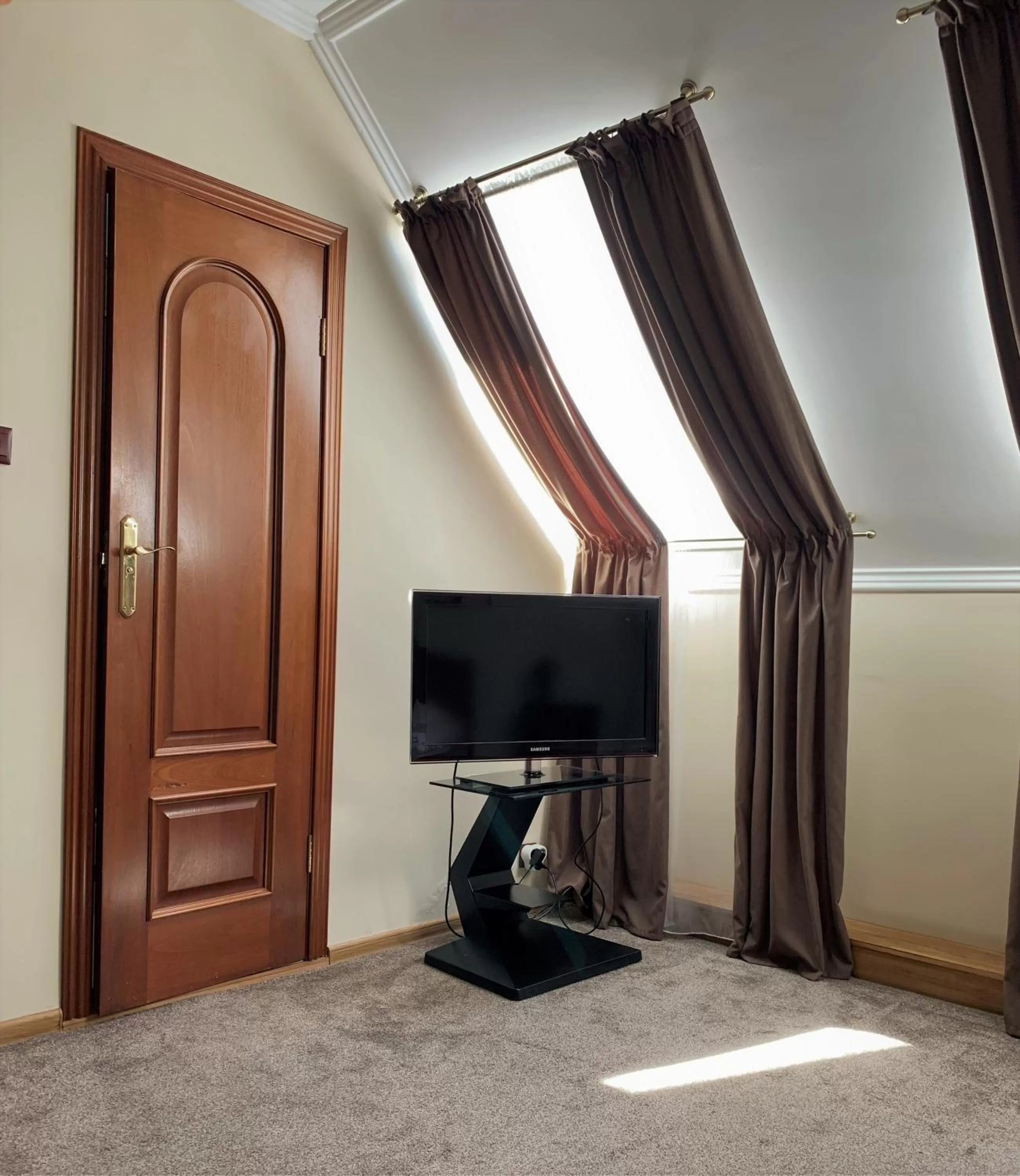 Communal lounge/ TV room in Eduard Hotel