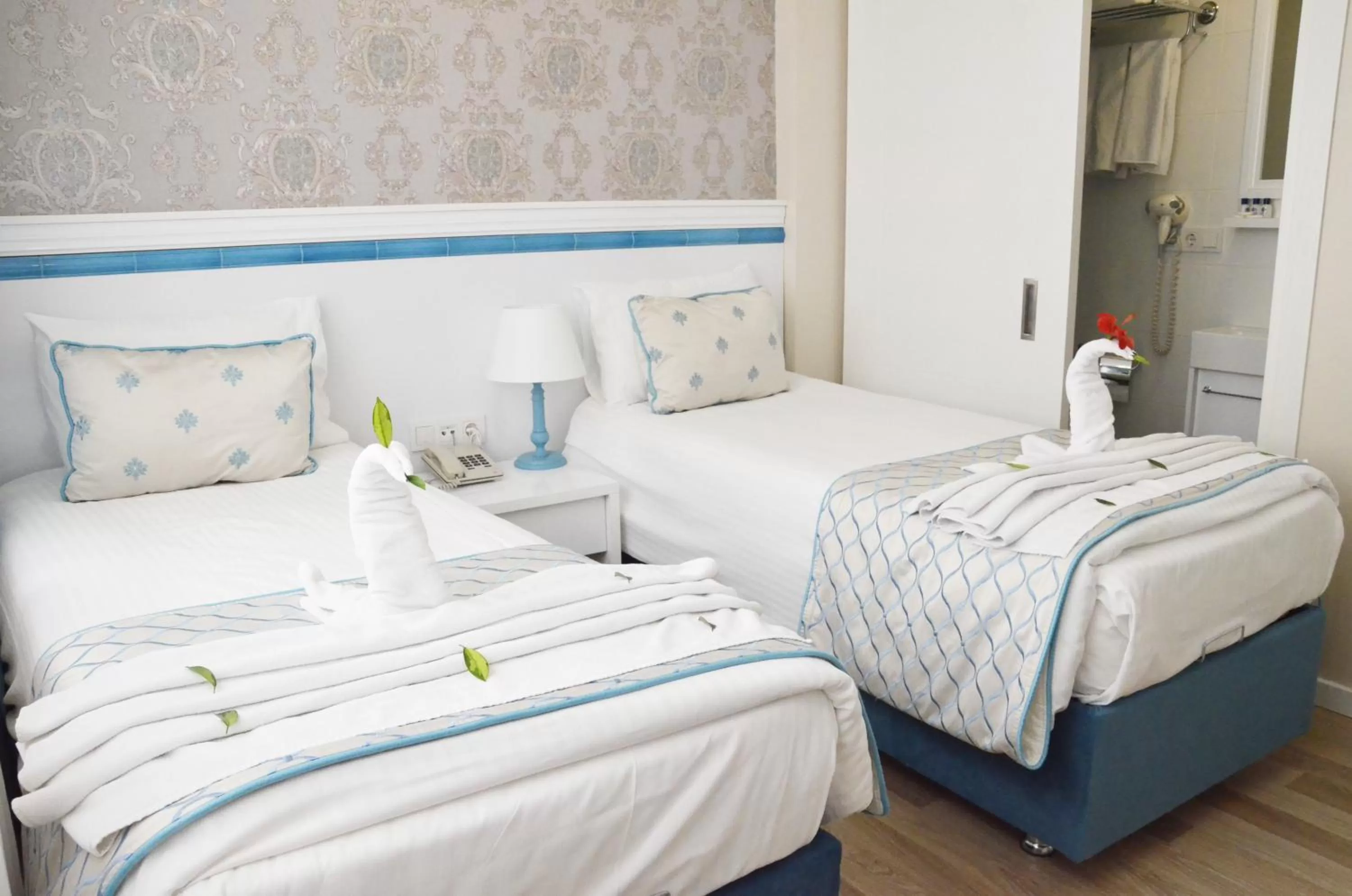 Bed in Star Holiday Hotel