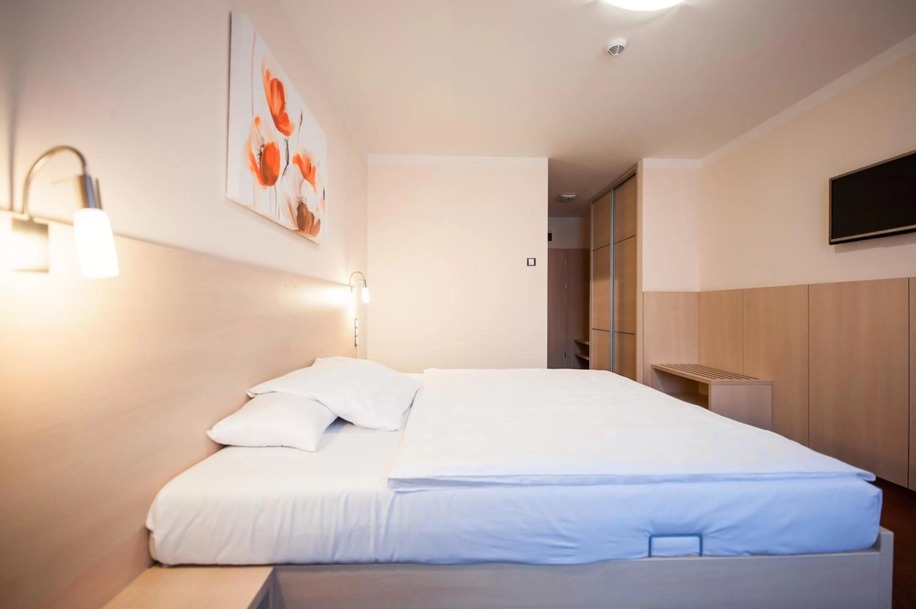 Bed in Hotel Pivovar