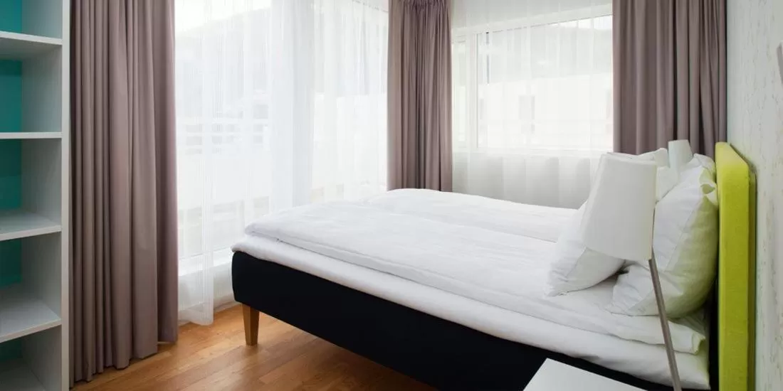 Bed in Thon Hotel Sandven