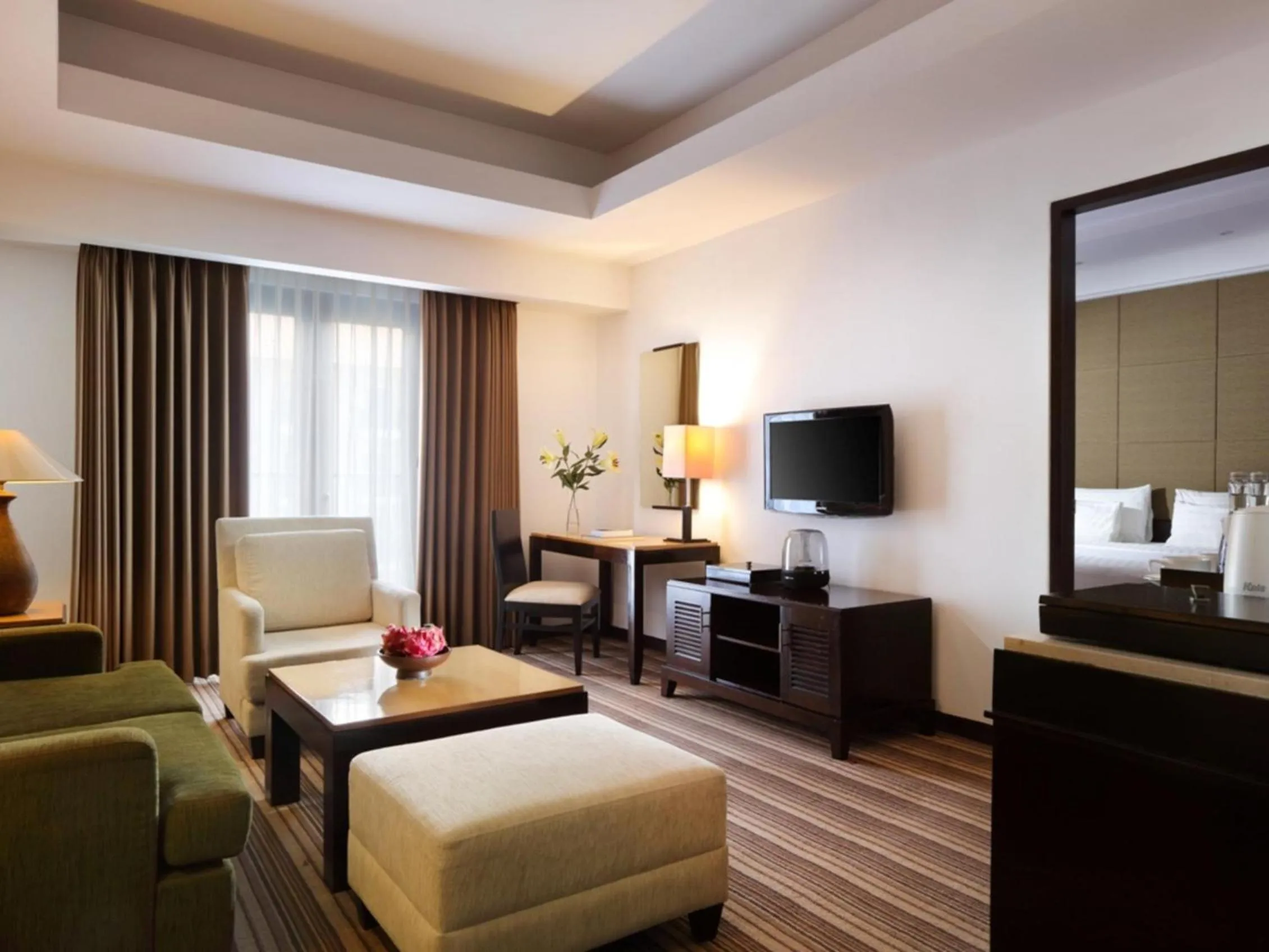 Living room, Bed in Hotel Santika Premiere Malang