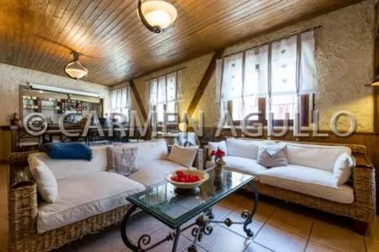 Communal lounge/ TV room in Posada el Campanario