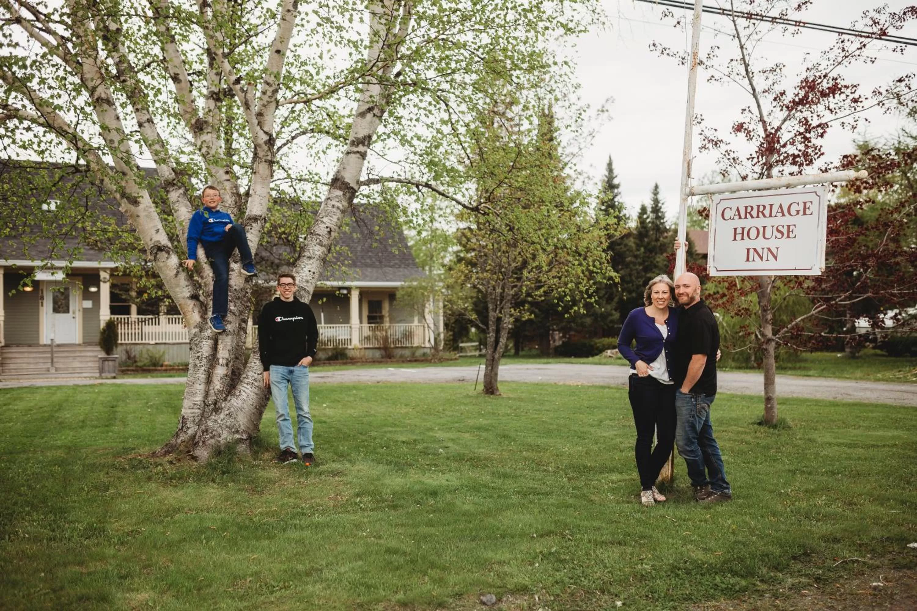 Property logo or sign in Carriage House Inn Four and a Half Stars