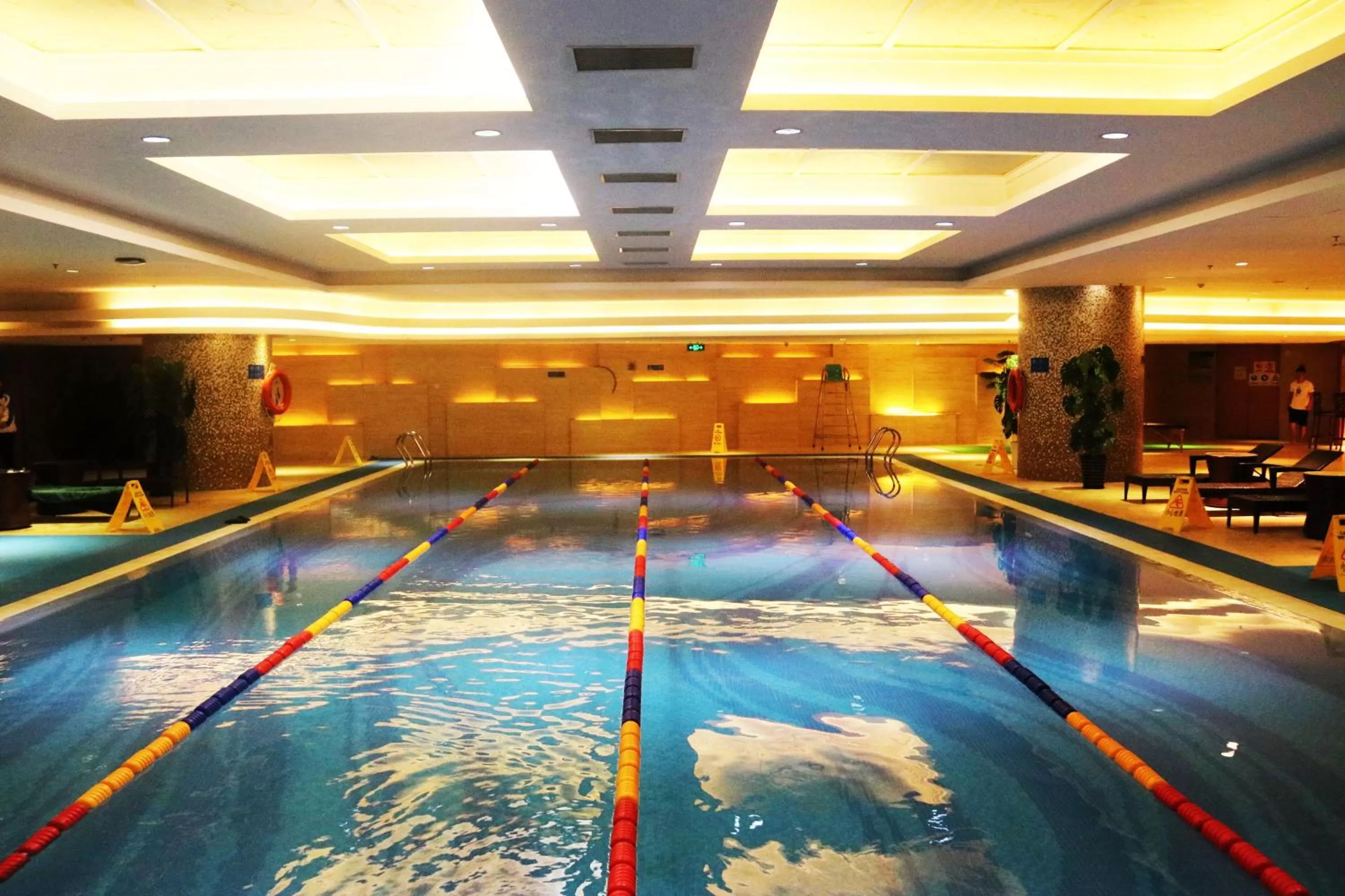Swimming pool in Wyndham Qingdao l Free Fixed-Time Shuttle Service Between Hotel and Airport & North Railway Station l Outdoor Children's Amusement Park l 1-Hour Play Snooker or Table Tennis