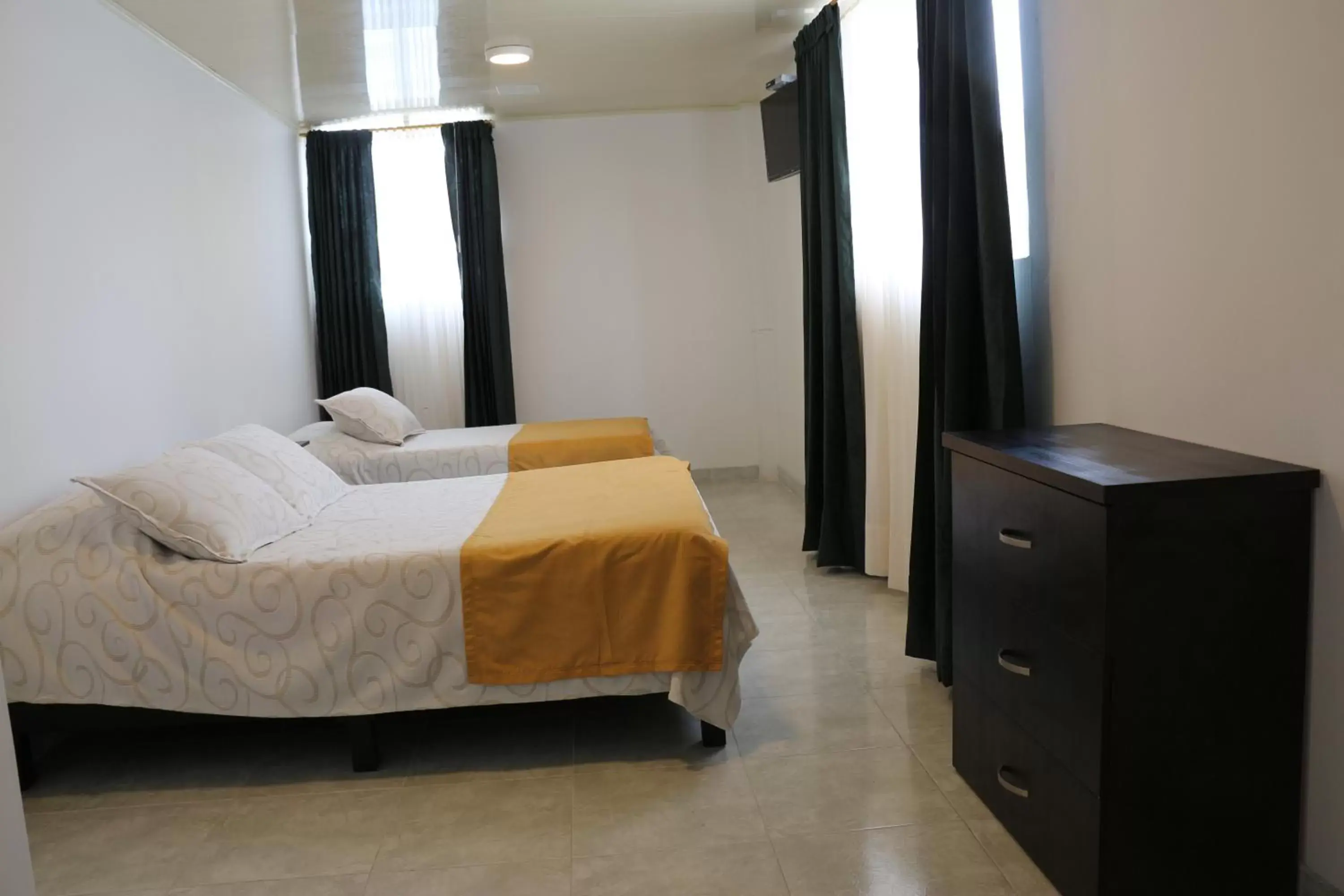 Quadruple Room with Shared Bathroom in Hotel Abadia Quadruple Room with Shared Bathroom in Hotel Abadia