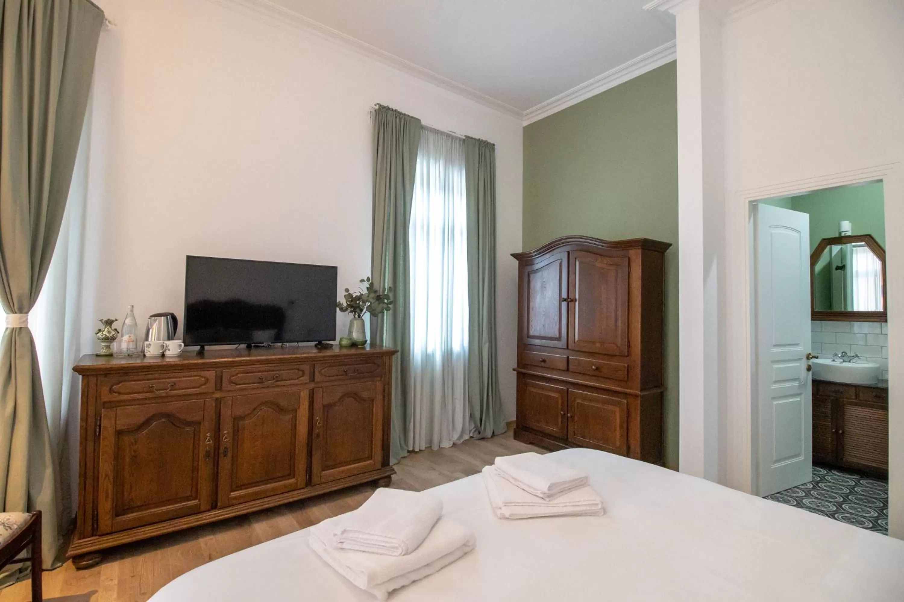 TV/Entertainment Center in Garden Villa Boutique Hotel